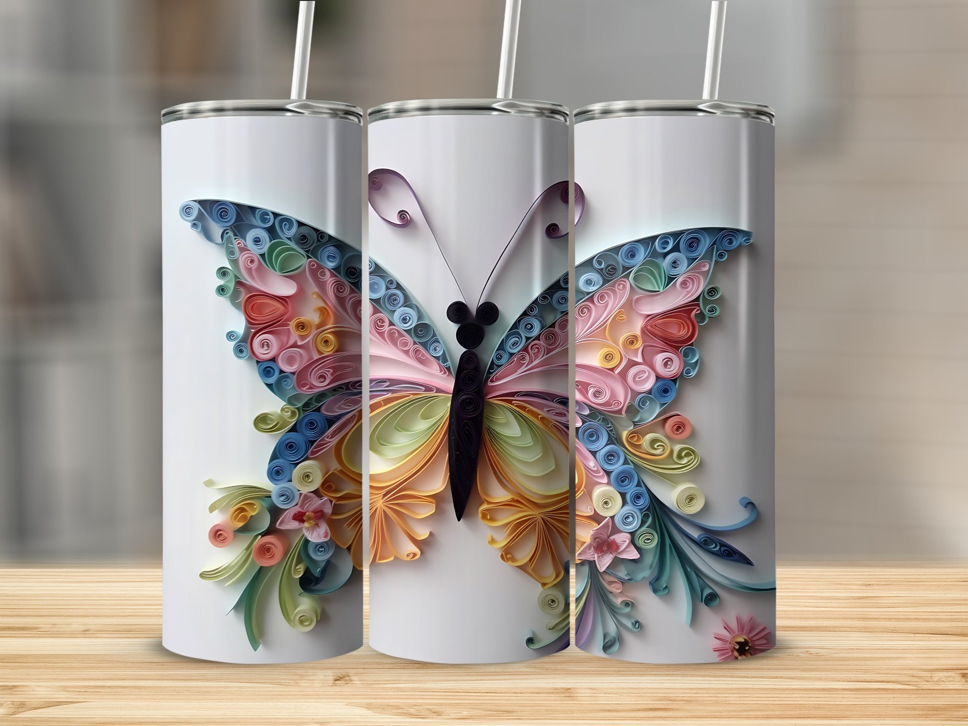 Three white tumblers featuring colorful quilled paper butterflies.