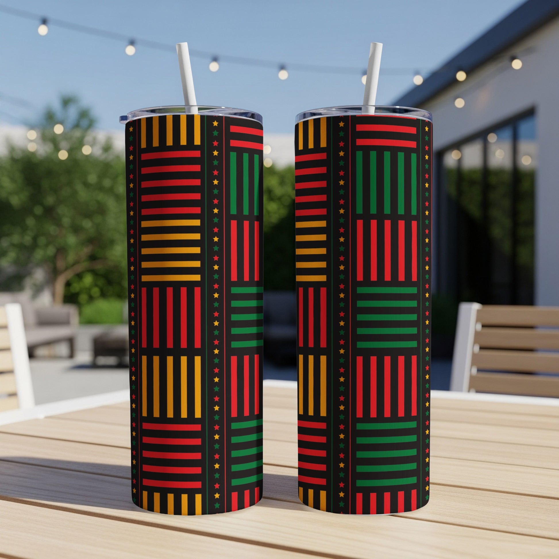 Two tumblers with a black background, featuring red, yellow, and green stripes and stars.