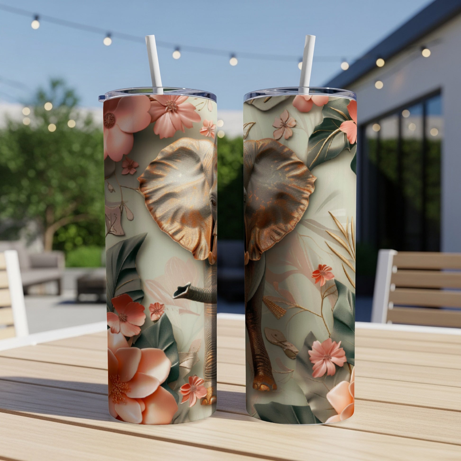 Two tumblers featuring a close-up of an elephant with floral and leaf accents.