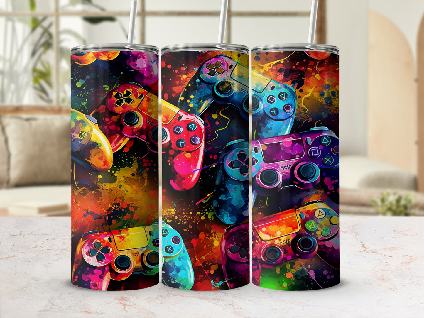 Three colorful video game controllers with abstract paint splatters.