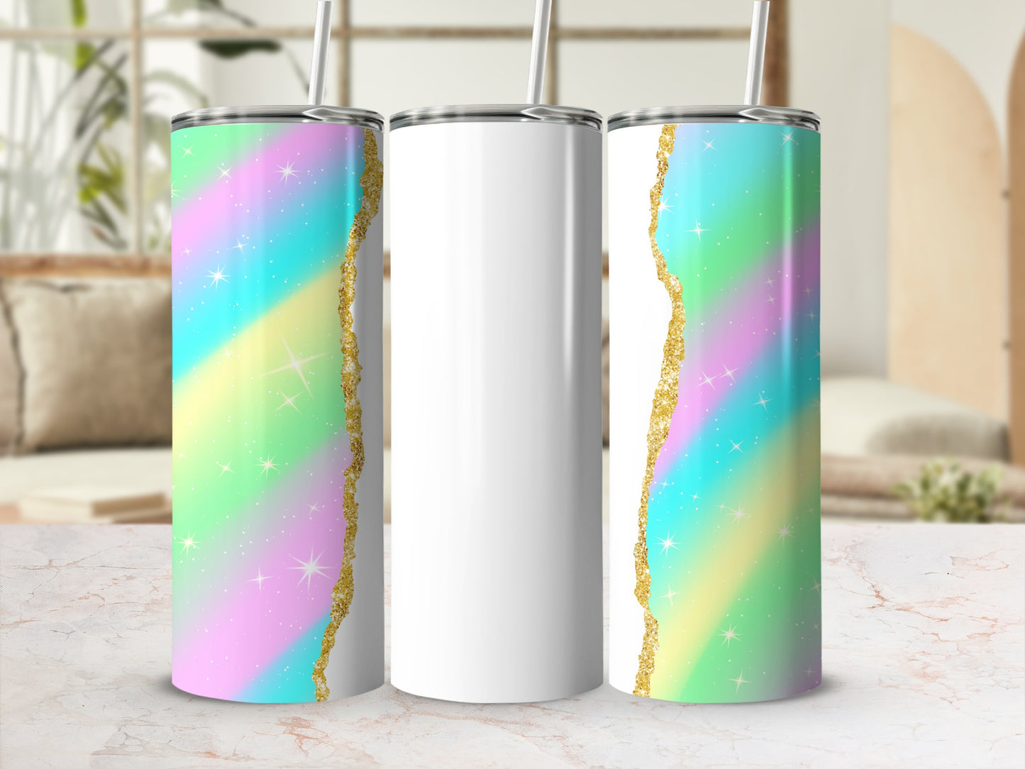 White tumbler with pastel rainbow glitter design and gold trim.