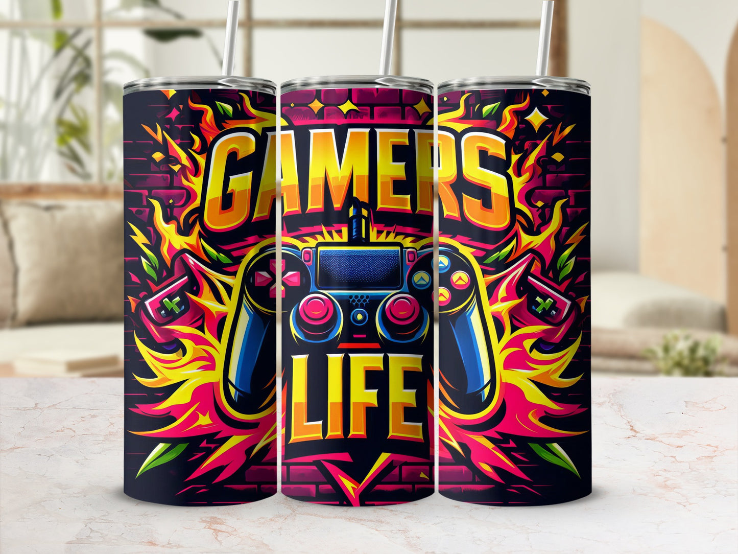 Tumbler with "GAMERS LIFE" text and gaming controller graphics.