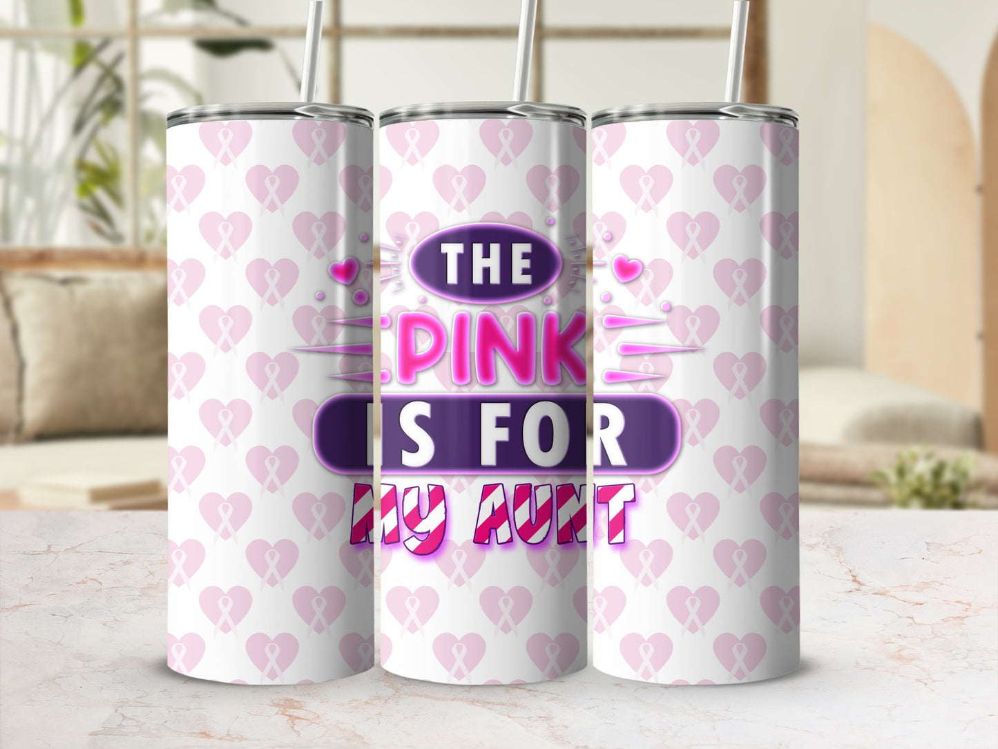 Pink tumbler with "The Pink Is For My Aunt" text and heart pattern.