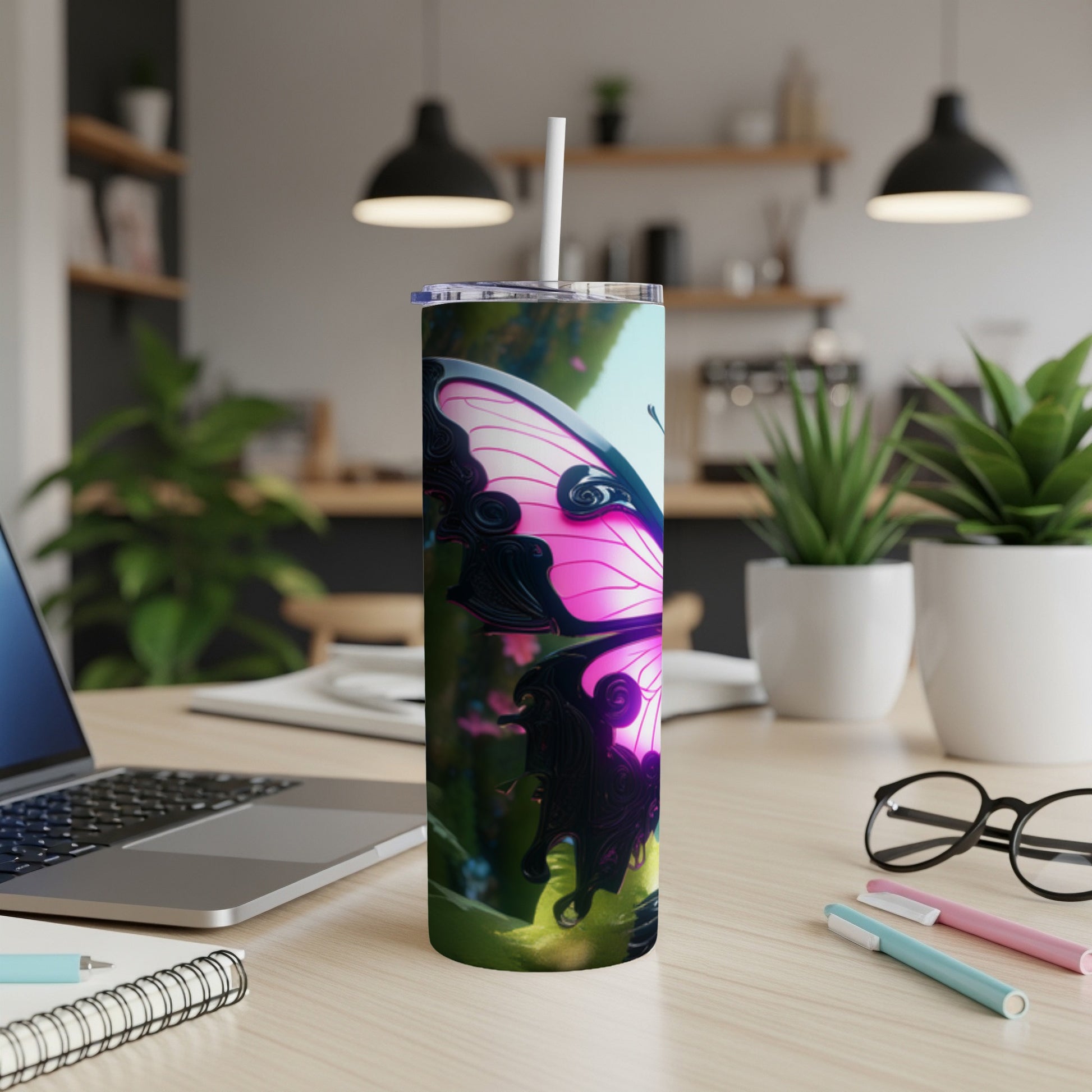 Tall tumbler with pink and black butterfly wings design.