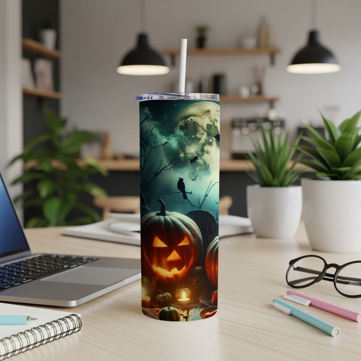 Halloween tumbler with jack-o'-lanterns, moon, bats, and a crow on a tombstone.