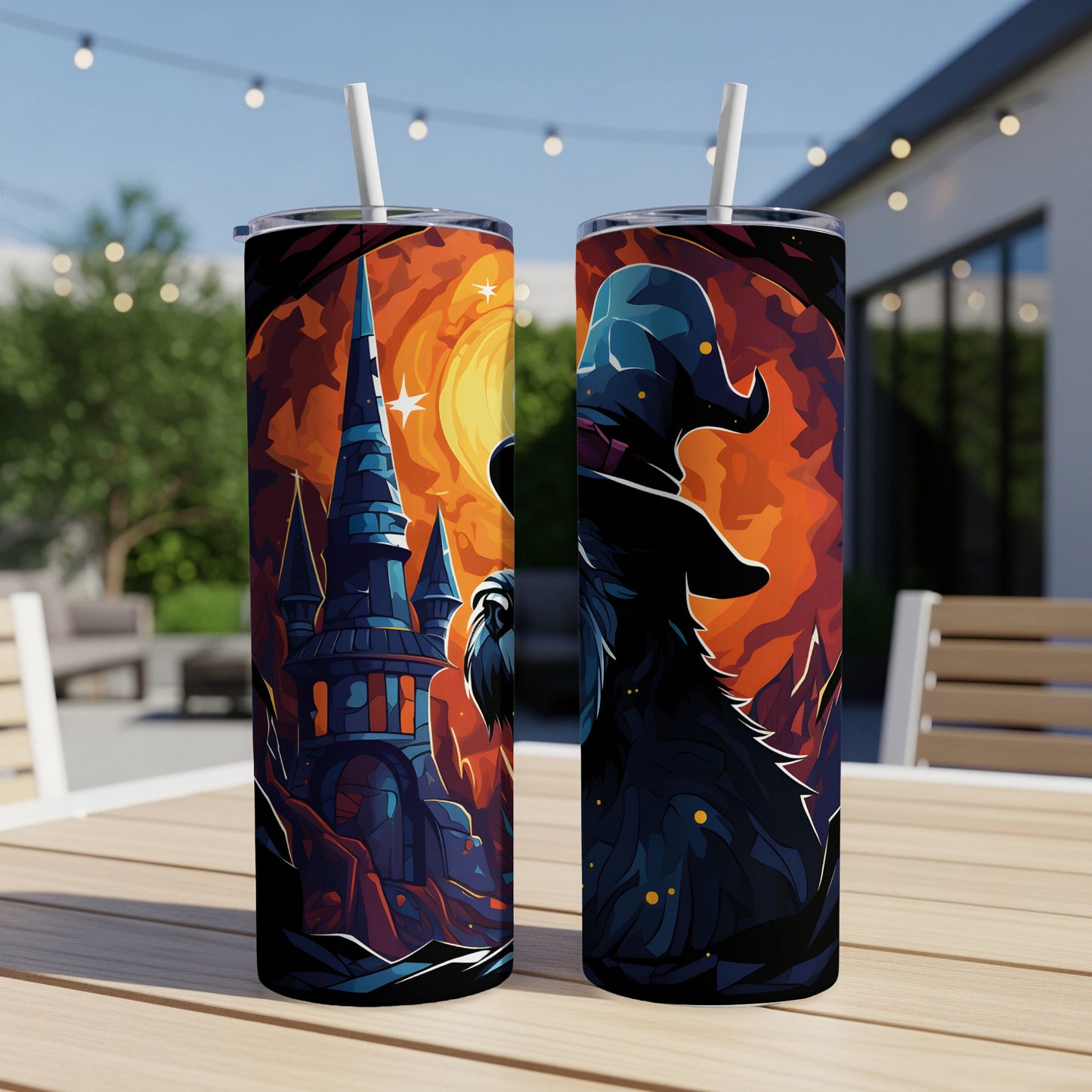 Two tumblers with a Halloween theme, featuring a castle and a wolf in a witch hat.