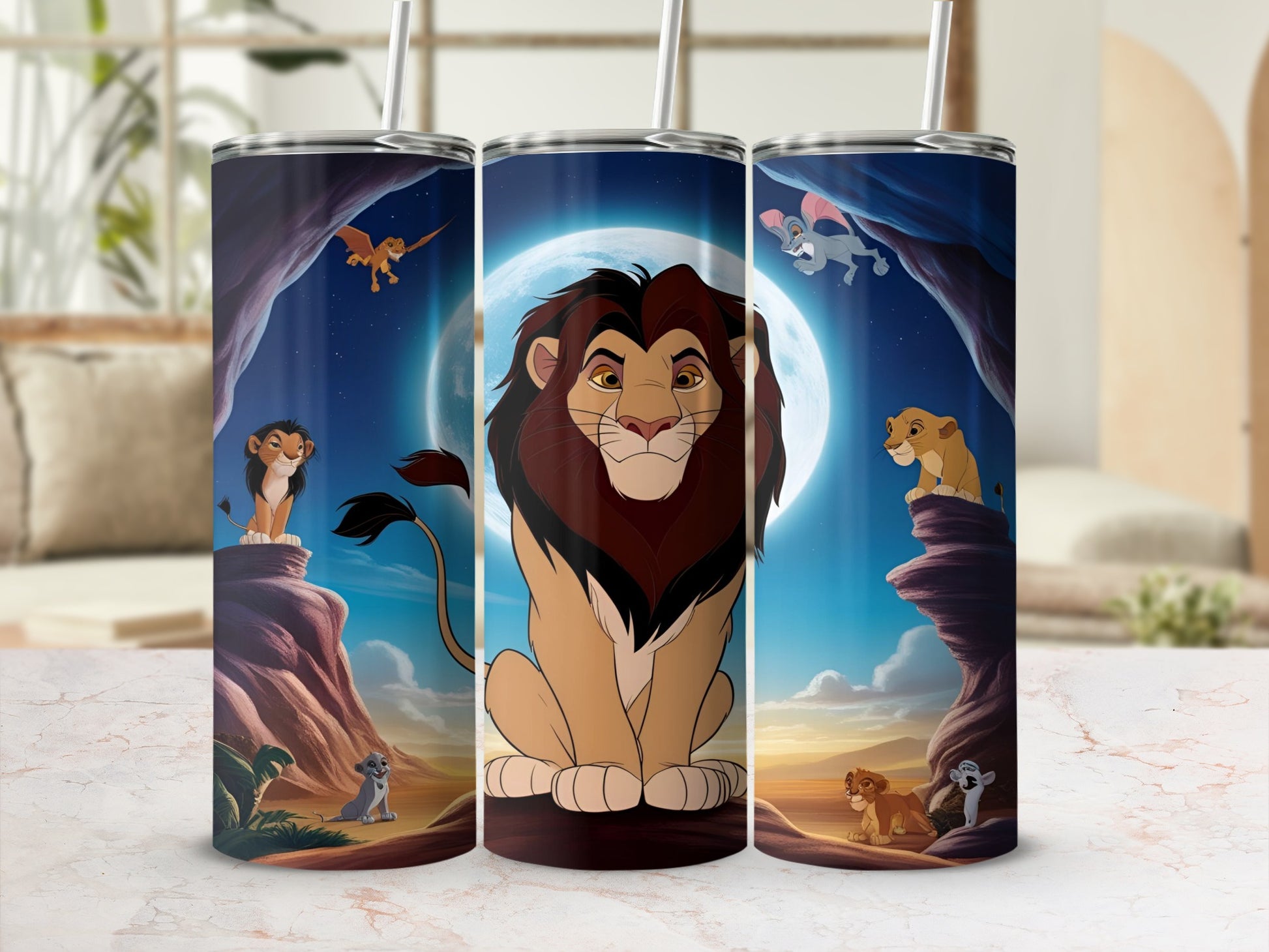 The Lion King characters Simba, Mufasa, and Pumbaa on a tumbler.
