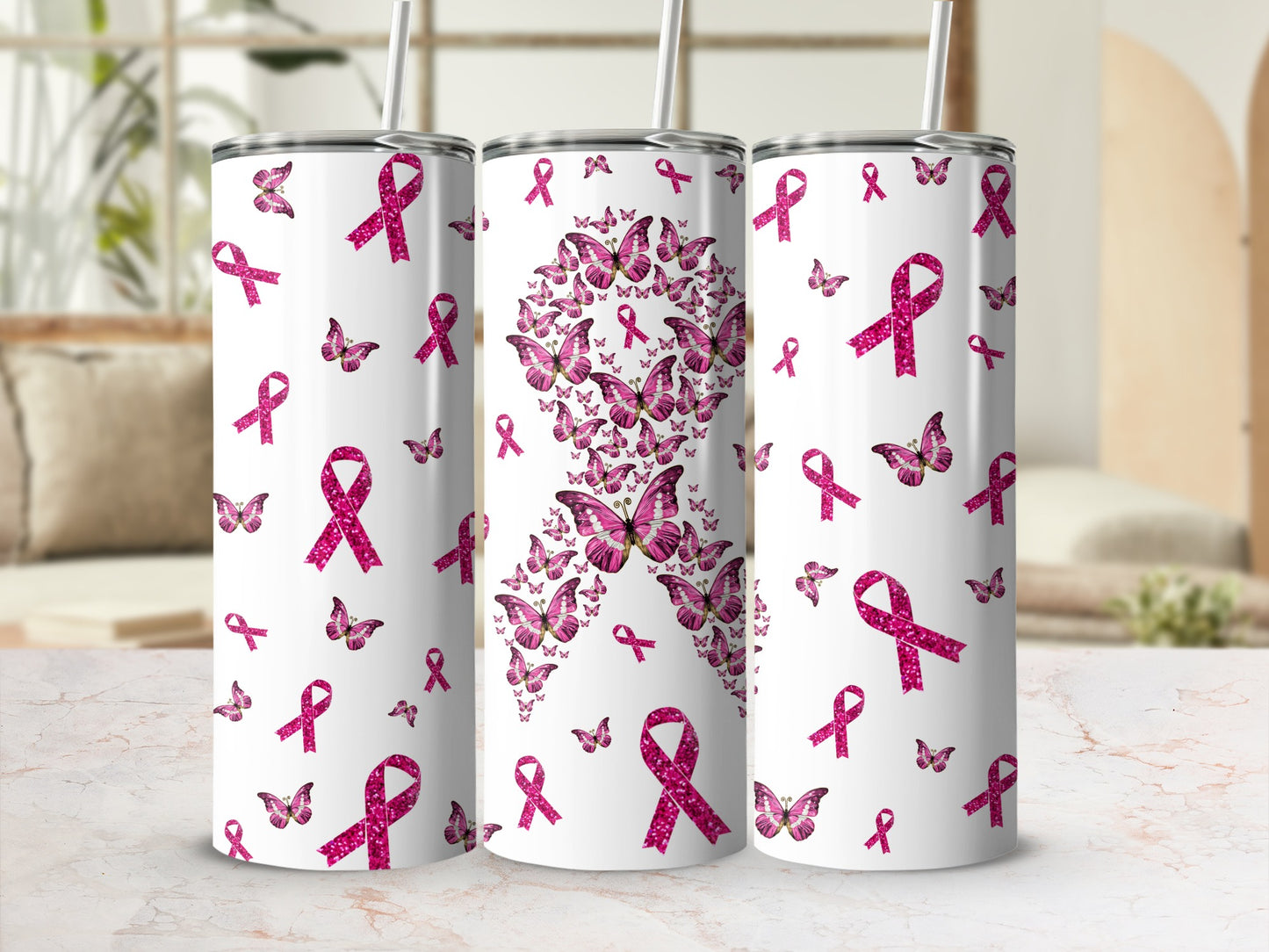 Tapered tumblers adorned with a pink ribbon and butterfly design.