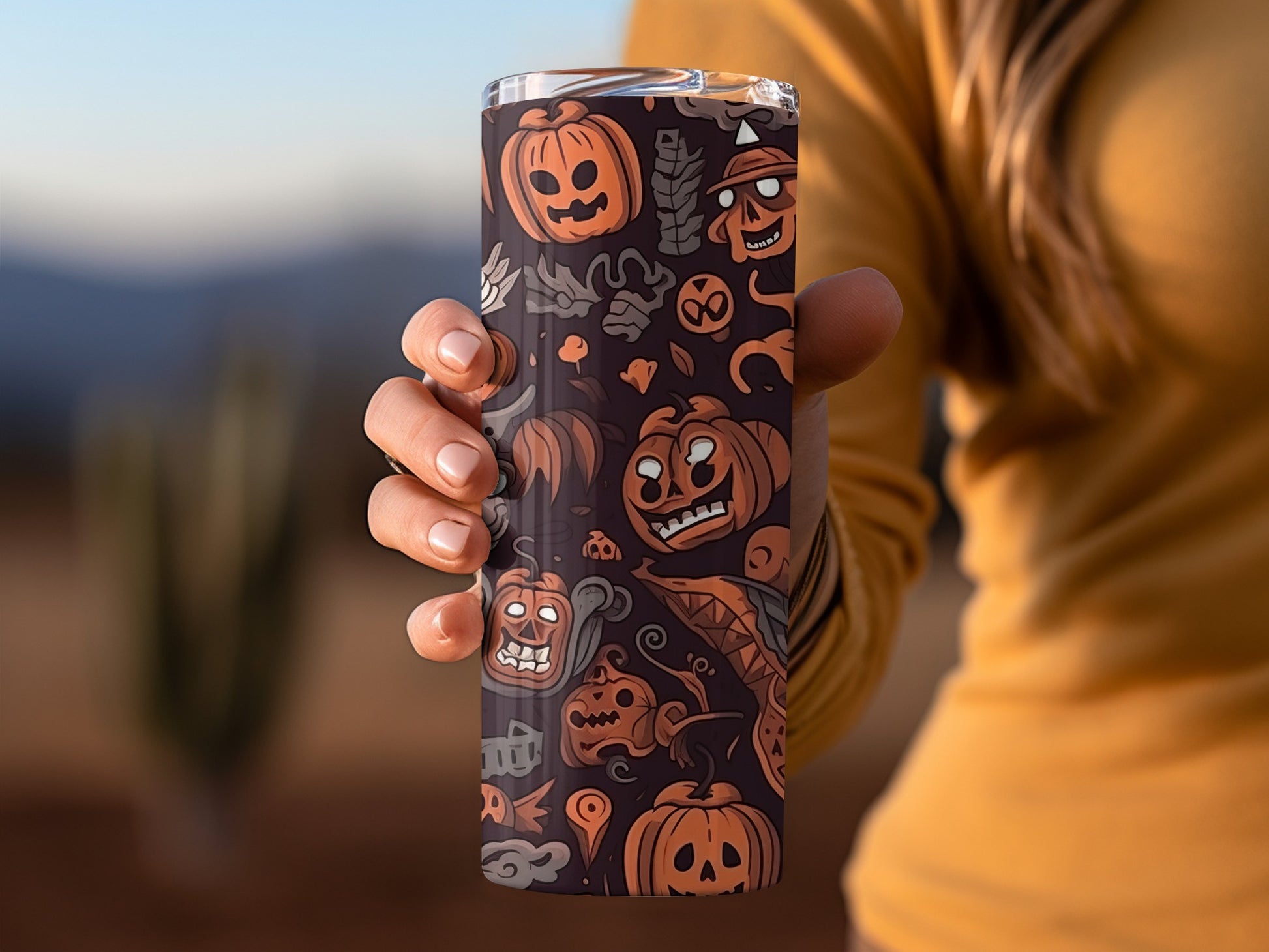 Halloween Themed Tumblers Decorated with Fun Pumpkin Faces