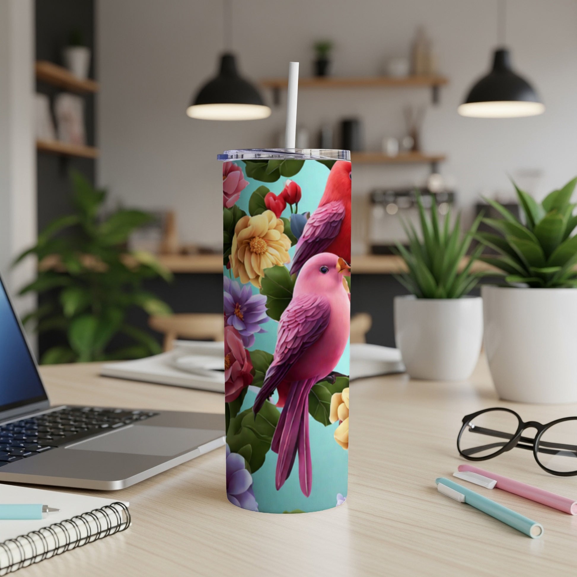 Pink parrots perch among colorful flowers on a tall tumbler.