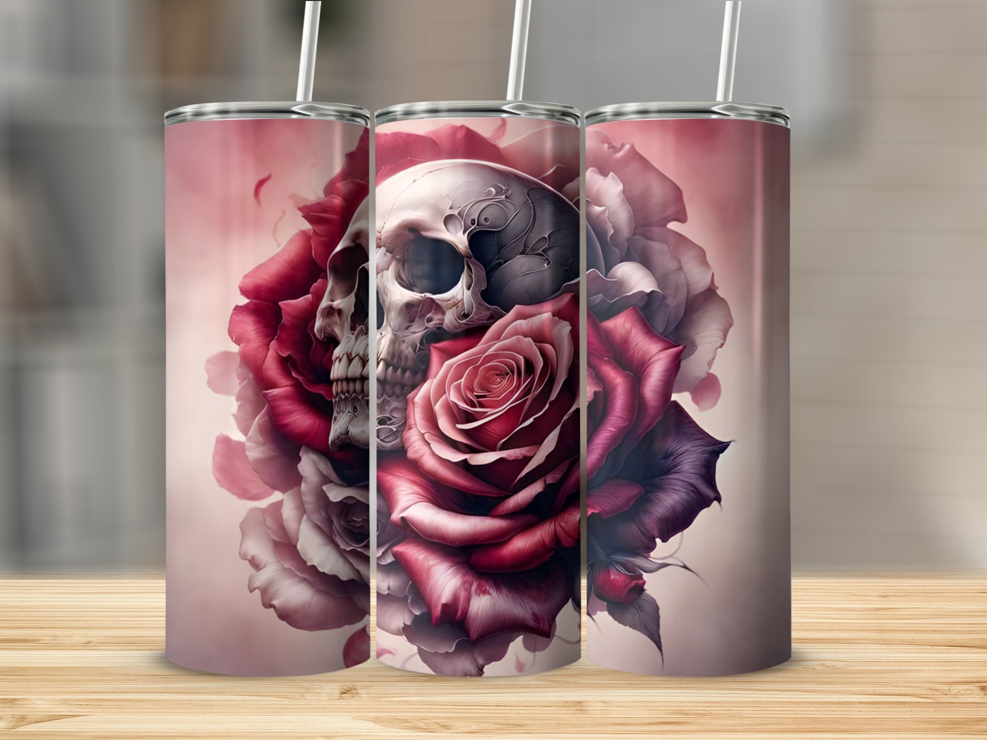 Tumbler with skull and roses design on a wooden surface.