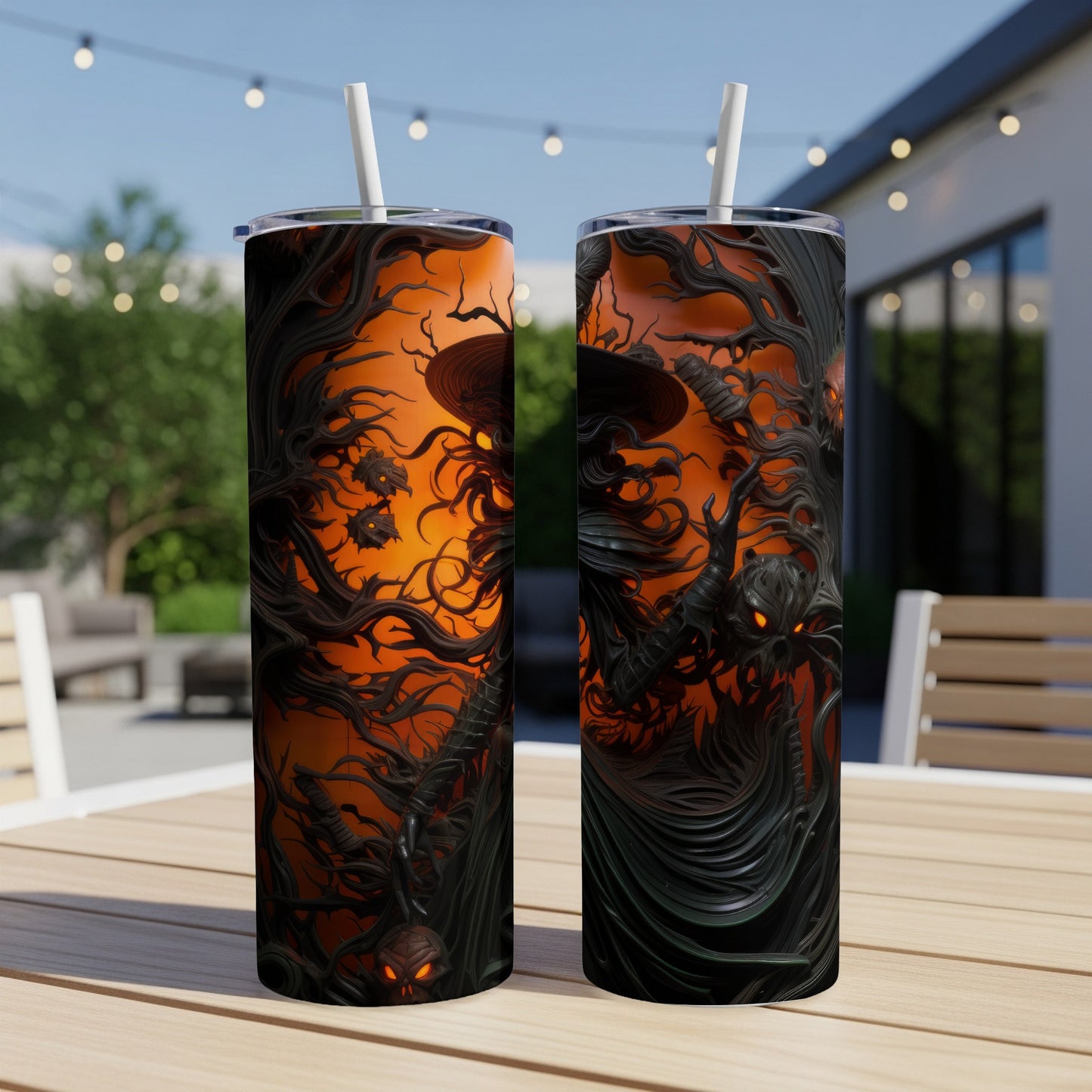 Two tumblers with a spooky Halloween design featuring a witch, jack-o'-lanterns, and gnarled trees.