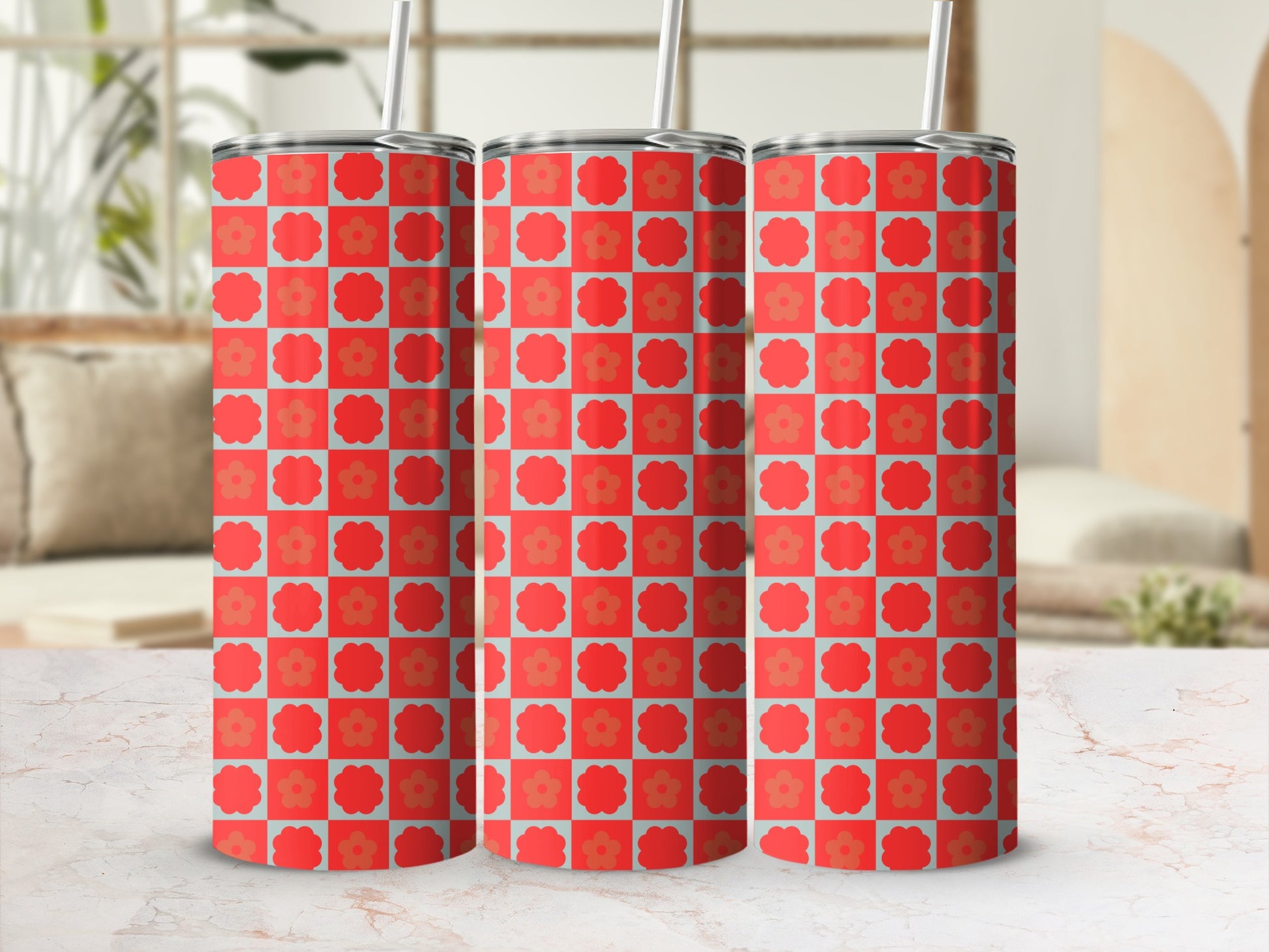 Three tumblers with a red and blue checkered floral pattern.