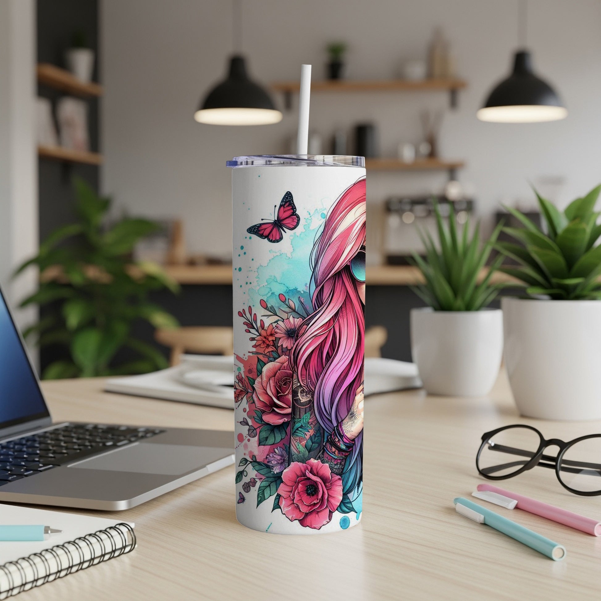 Pink-haired woman with floral accents on a white tumbler, with a butterfly.