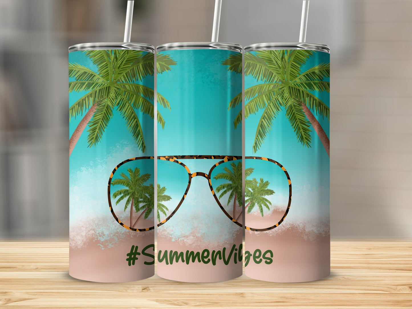 Three tumblers with palm trees and sunglasses reflecting #SummerVibes.