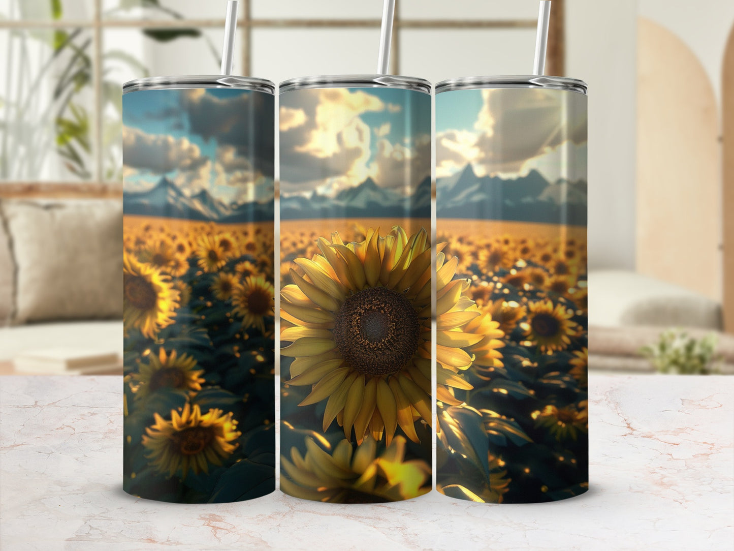 Three tumblers with sunflower field and mountain landscape design.