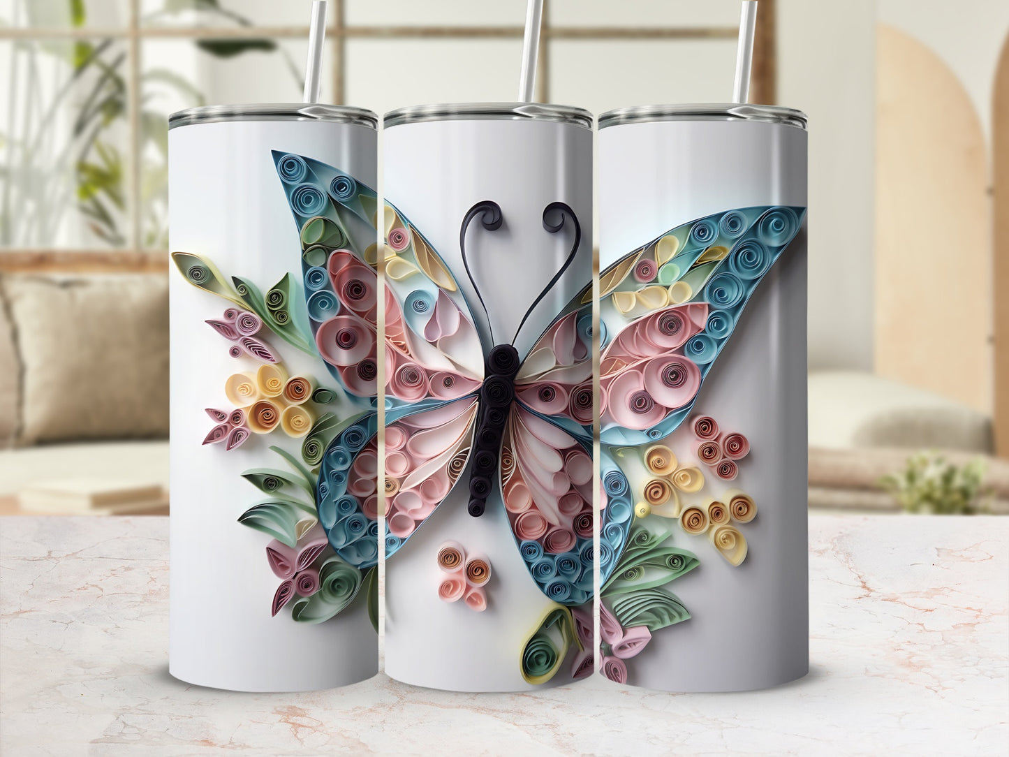 Three travel mugs featuring a colorful butterfly design made from quilled paper.