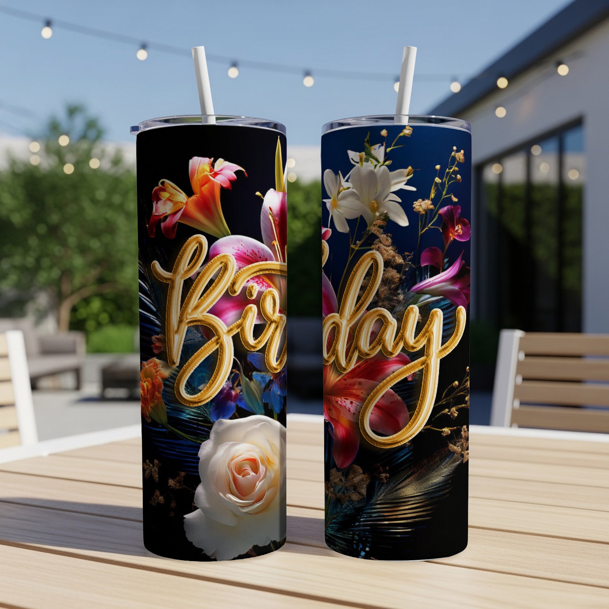 Two tumblers with floral designs and "Birthday" text, outdoors.