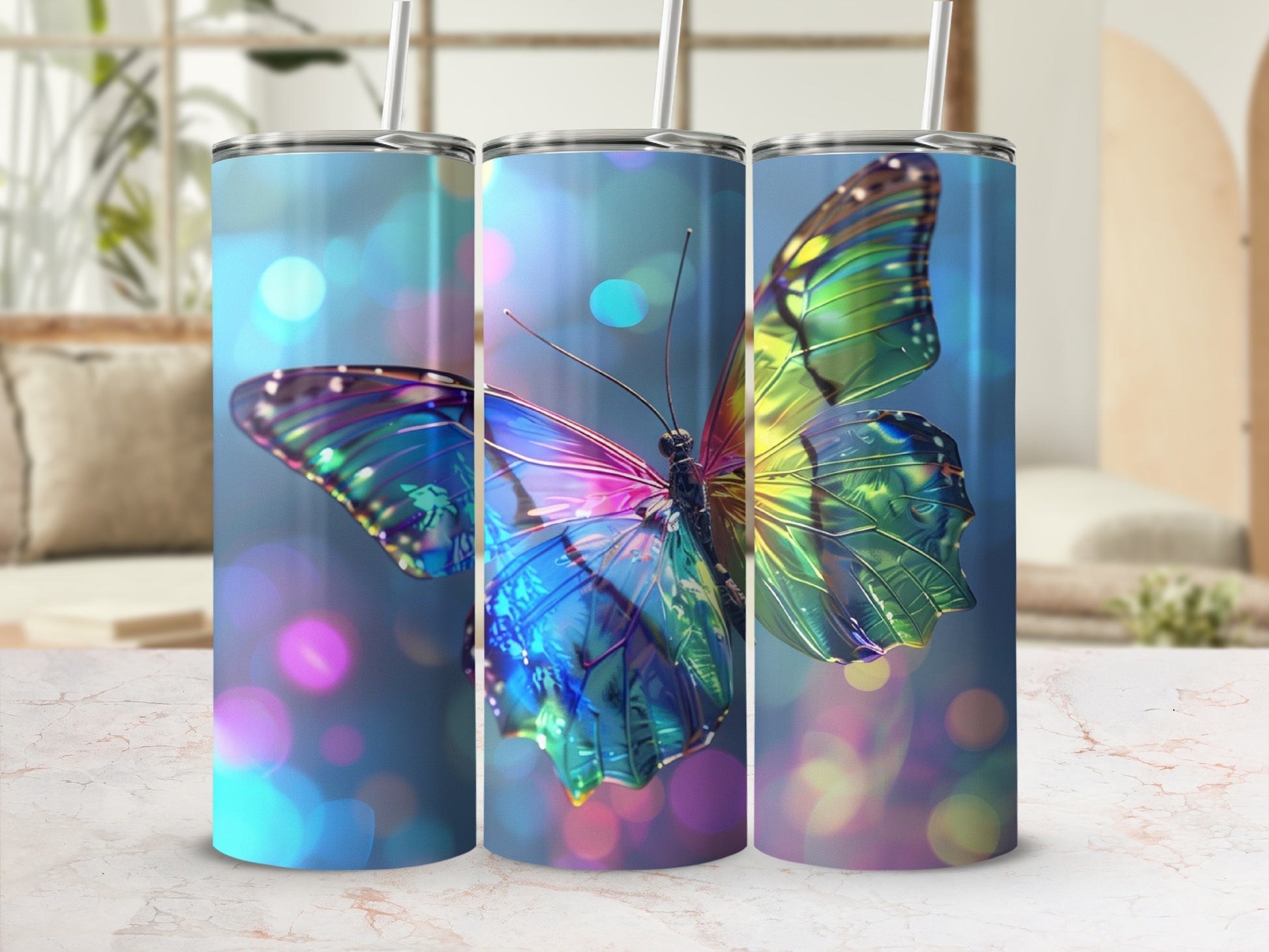 Iridescent butterfly design on a set of three skinny tumblers with bokeh background.