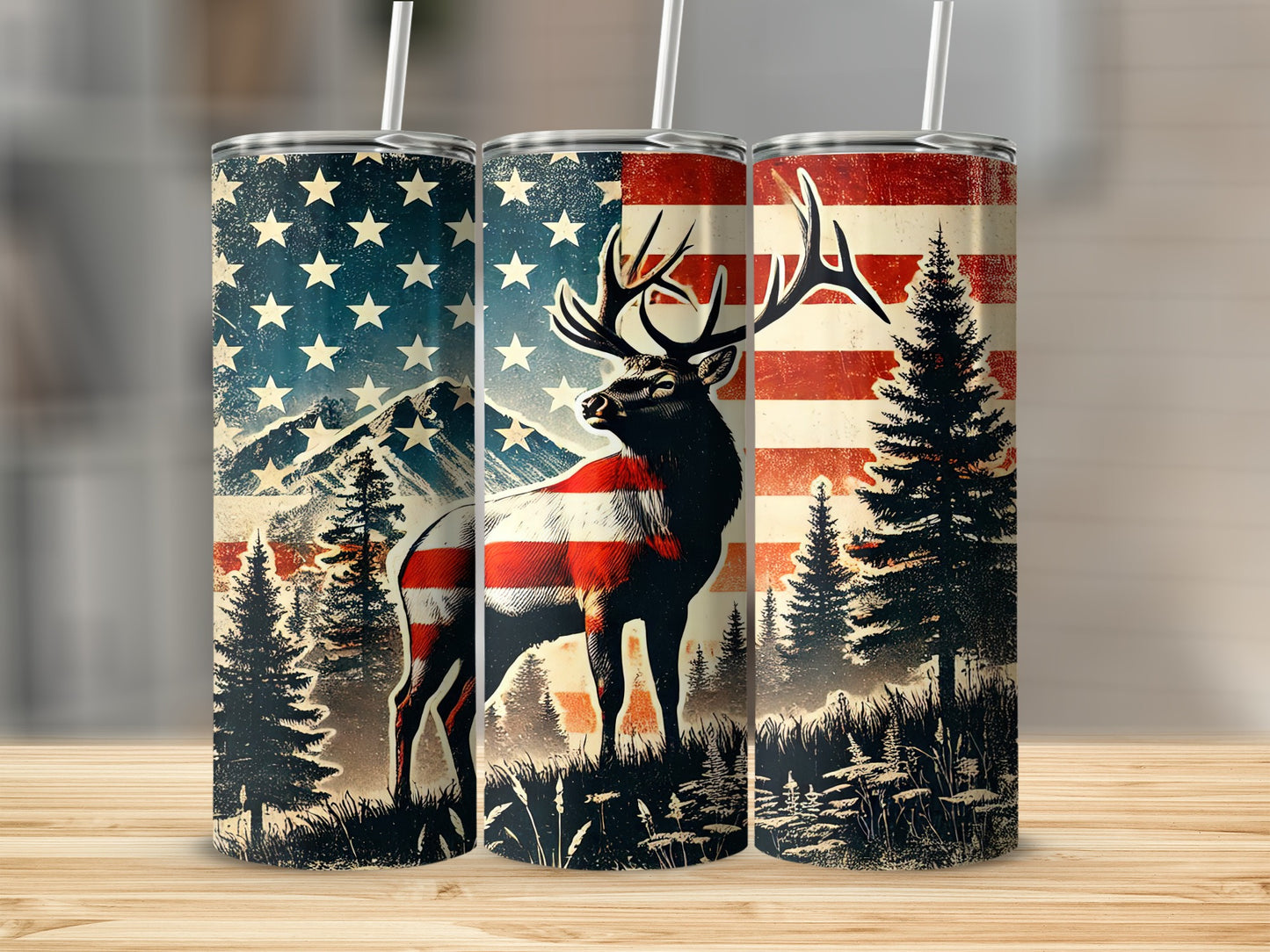 American flag elk and pine trees tumbler on wooden surface.