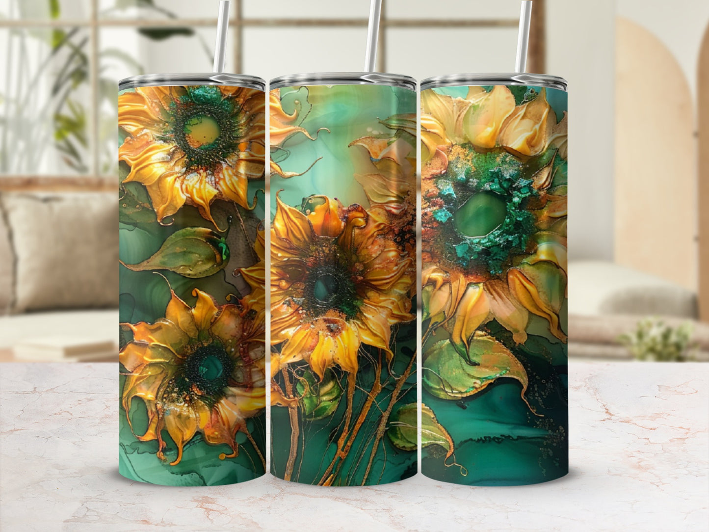 Three tumblers with vibrant, textured sunflower designs on an abstract, marbled background.