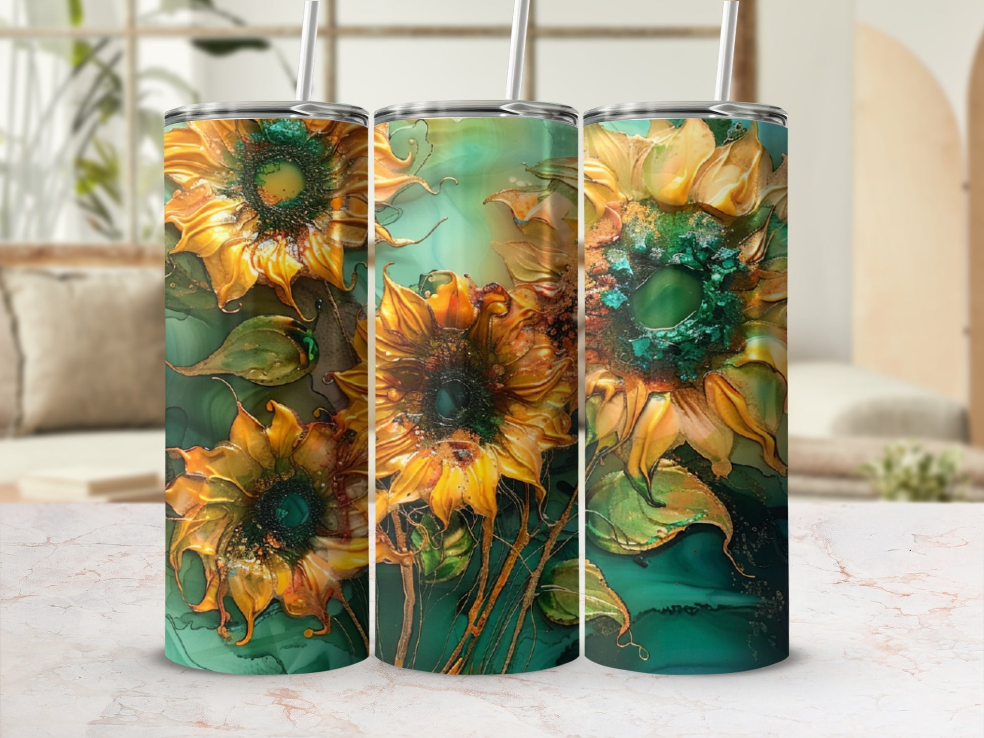 Three tumblers with vibrant, textured sunflower designs on an abstract, marbled background.