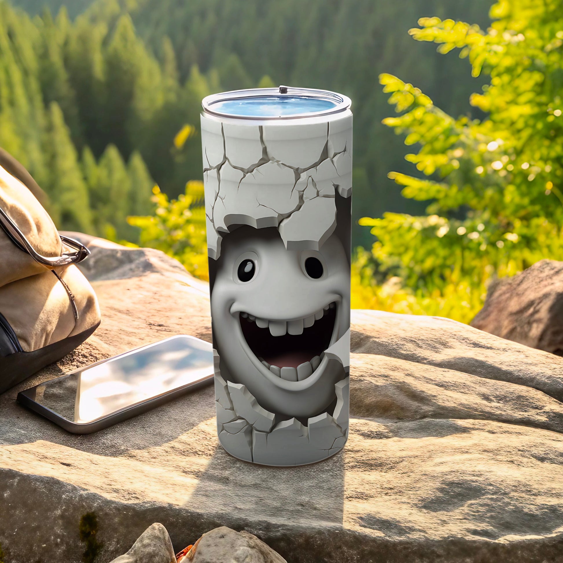 White tumbler with a cracked surface revealing a smiling cartoon face.