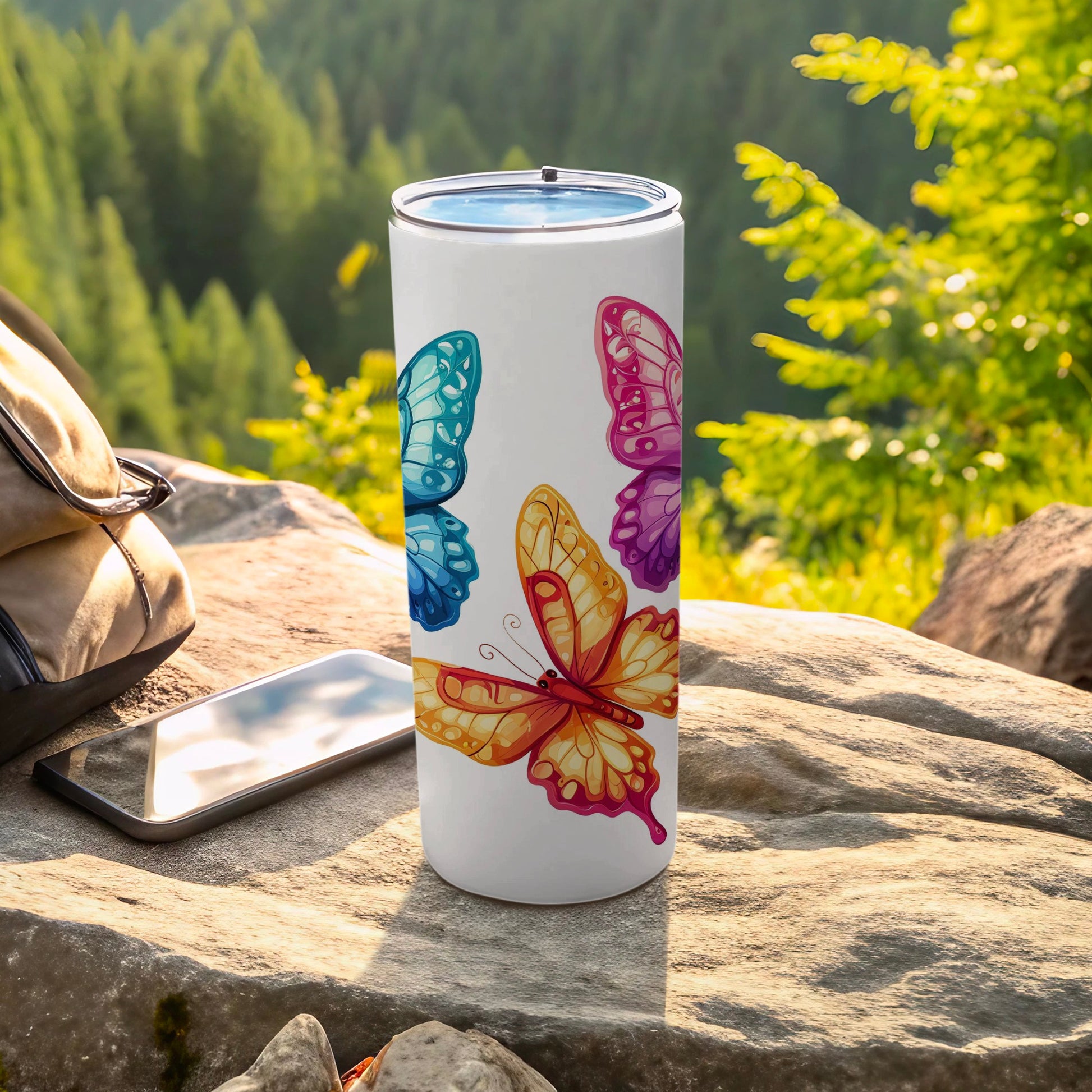Colorful Butterfly Pattern White Tumbler Outdoor Adventure product type

Tumbler
Butterfly
Colorful
Nature
Outdoor
Drinkware
Travel tumbler
Insulated tumbler
Beverage container
Camping essential
Hiking gear
White design
Butterfly pattern
Vibrant colors
Gift idea
Forest scene
Rock background
Picnic accessory
Water bottle
Adventure style
