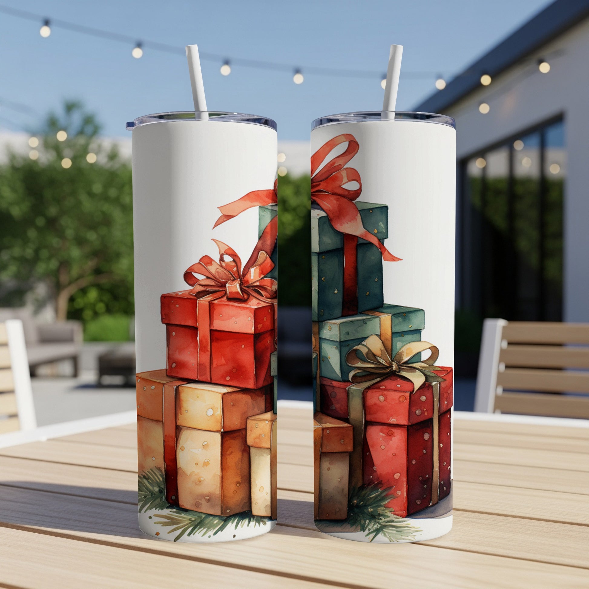 Two tumblers decorated with stacks of wrapped Christmas gifts and red bows.