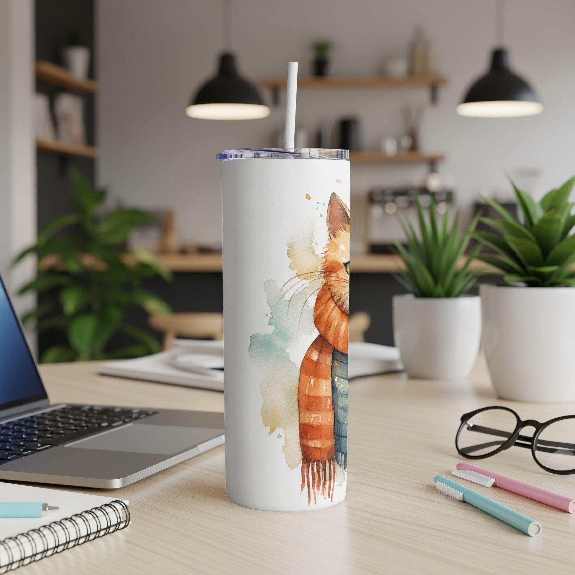 White tumbler with watercolor cat wearing an orange scarf.