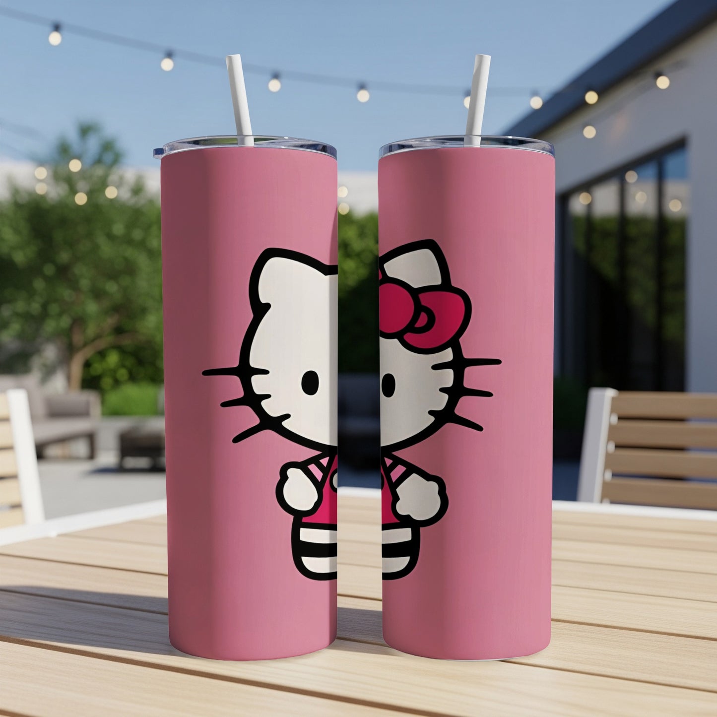 Hello Kitty tumbler with pink and white design on a table.