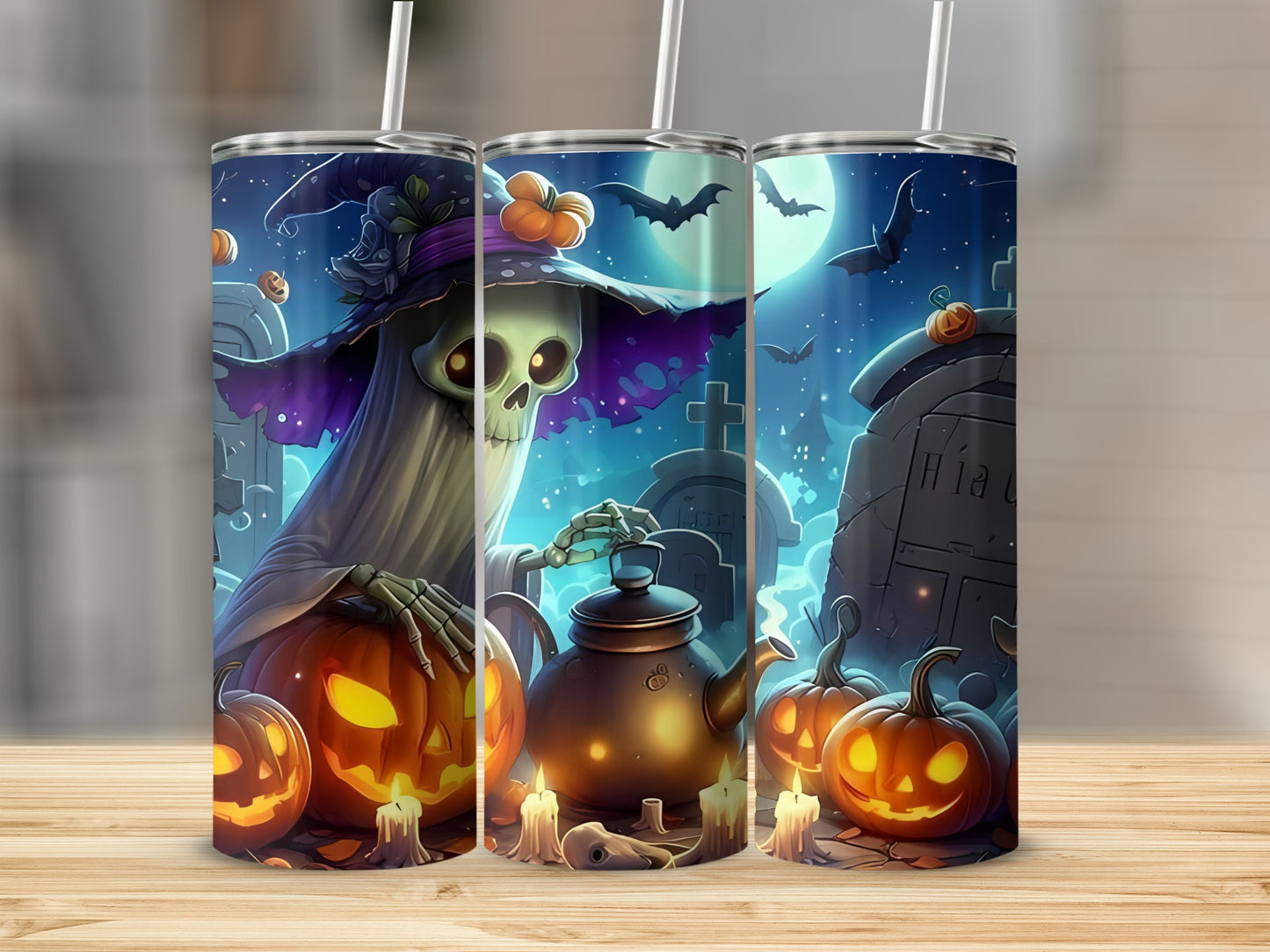 Halloween themed tumblers with spooky skeleton, pumpkins, bats, and graveyard scene.