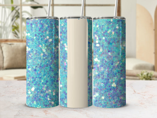 Three glitter tumblers with straws on a marble surface.