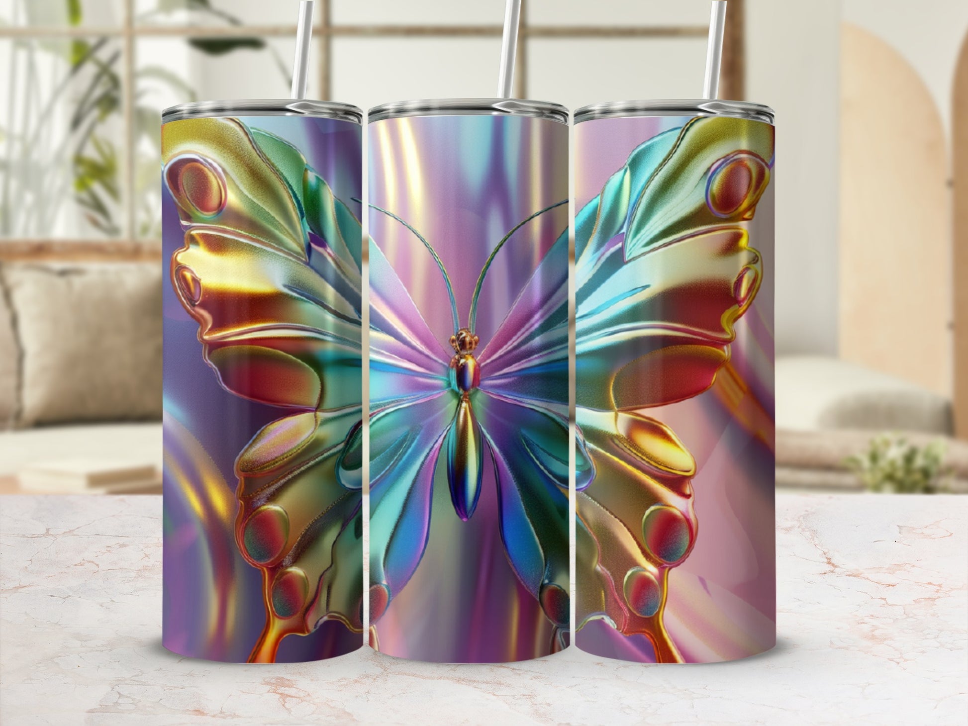 Iridescent butterfly tumbler with straw on marbled surface.