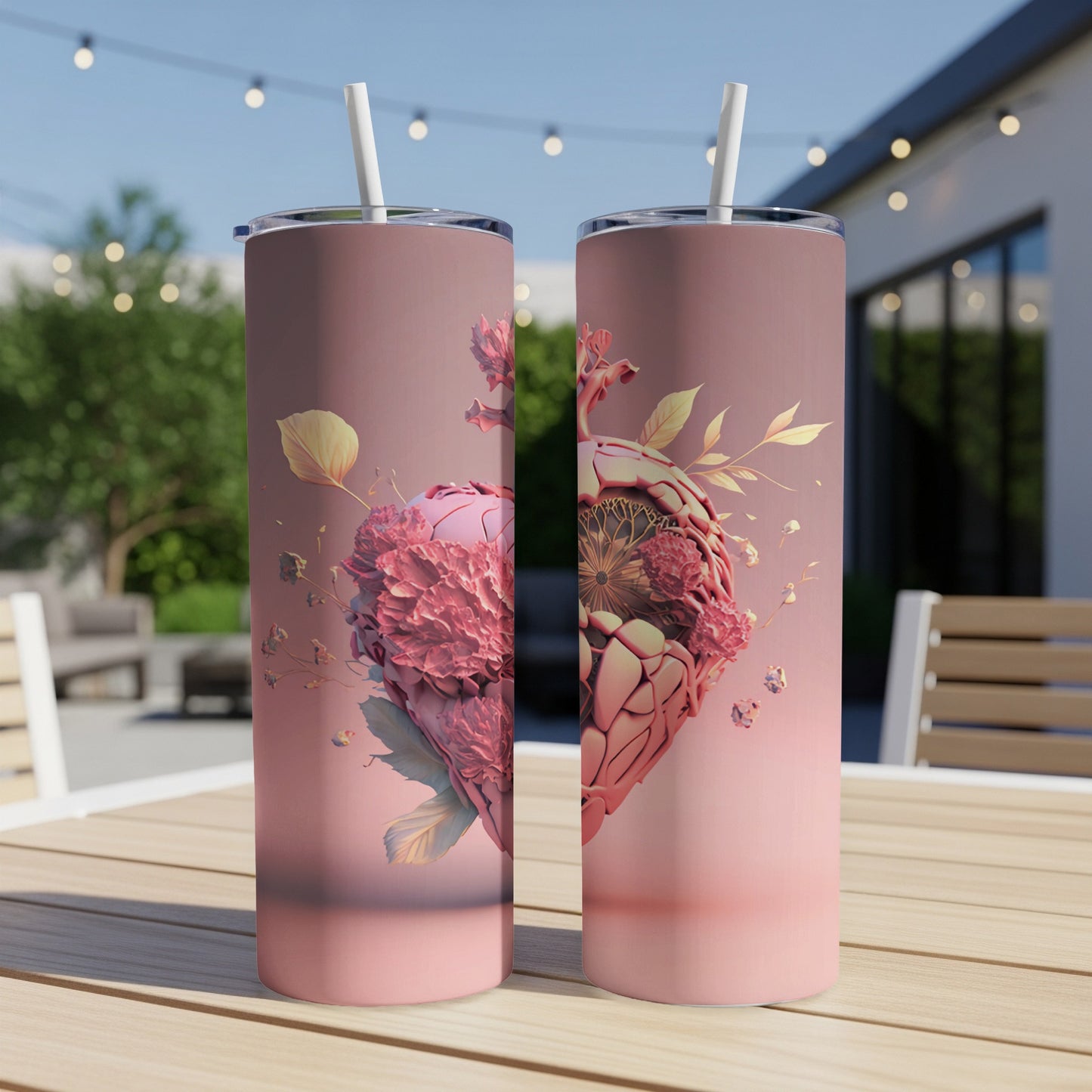 Two tall, slender tumblers with a stylized anatomical heart and floral design.
