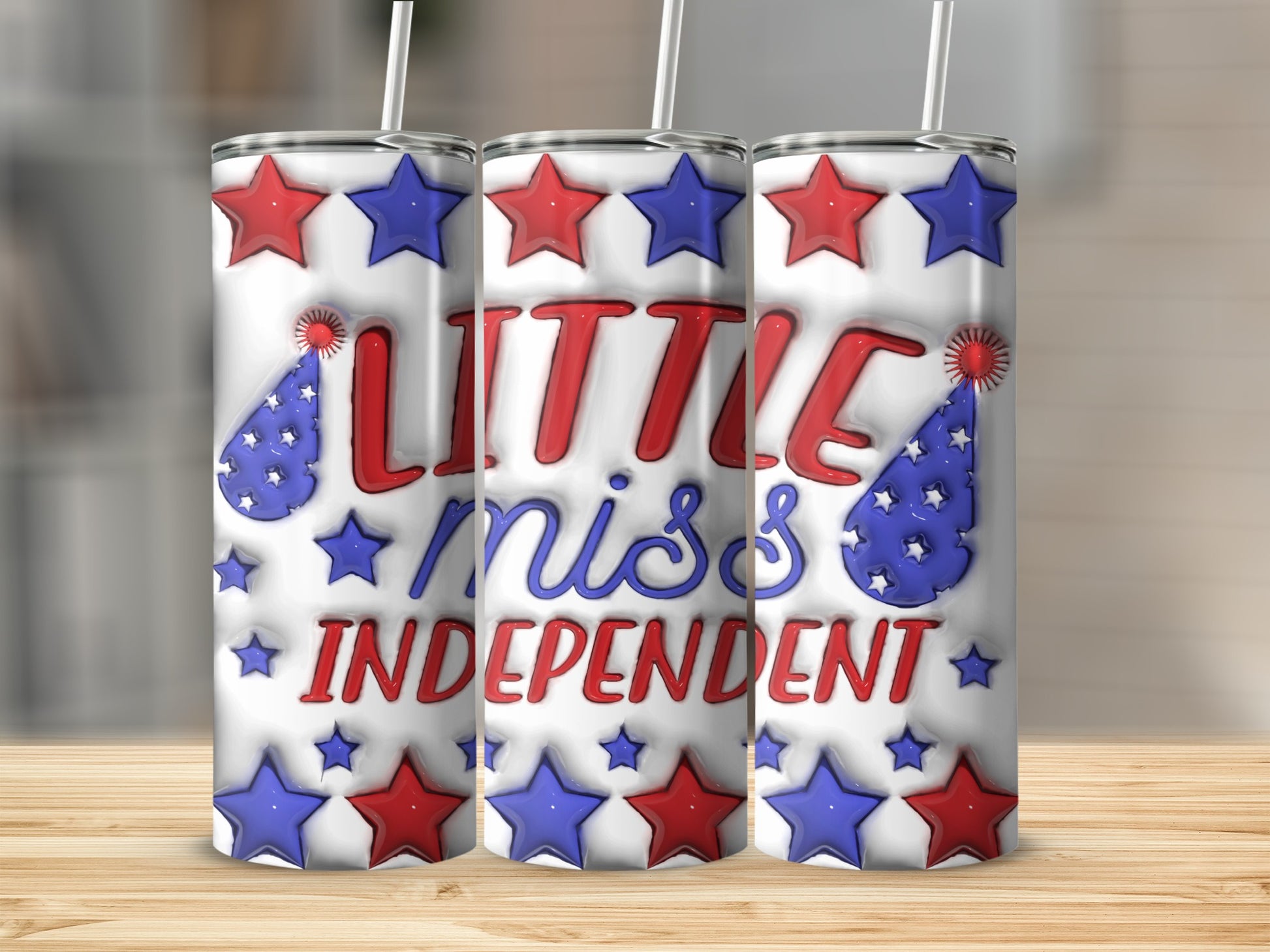 White tumbler with red, white, and blue stars and text: "Little Miss Independent".