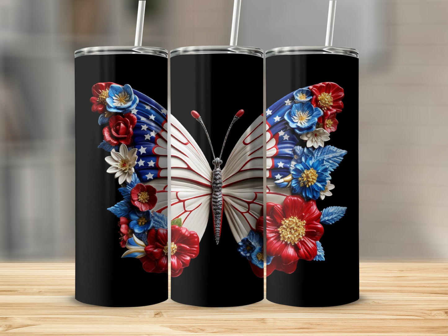 Black tumbler with a patriotic butterfly design adorned with red, white, and blue flowers.