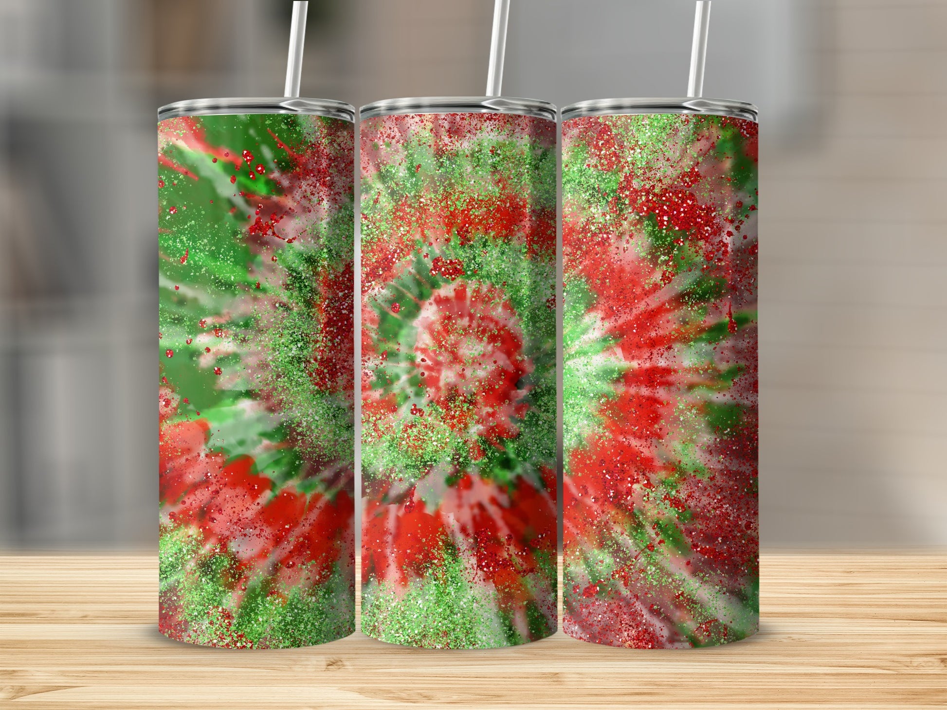 Three tumblers with a red, green, and white glitter tie-dye pattern.