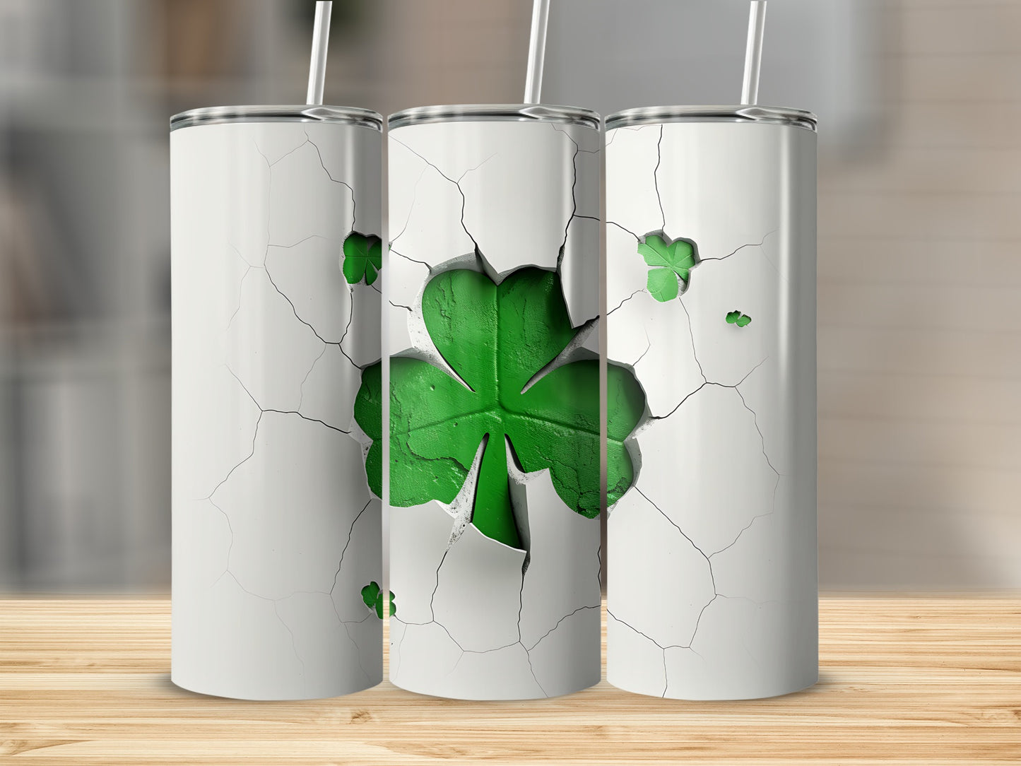 Three white tumblers with cracked surface revealing green shamrocks.