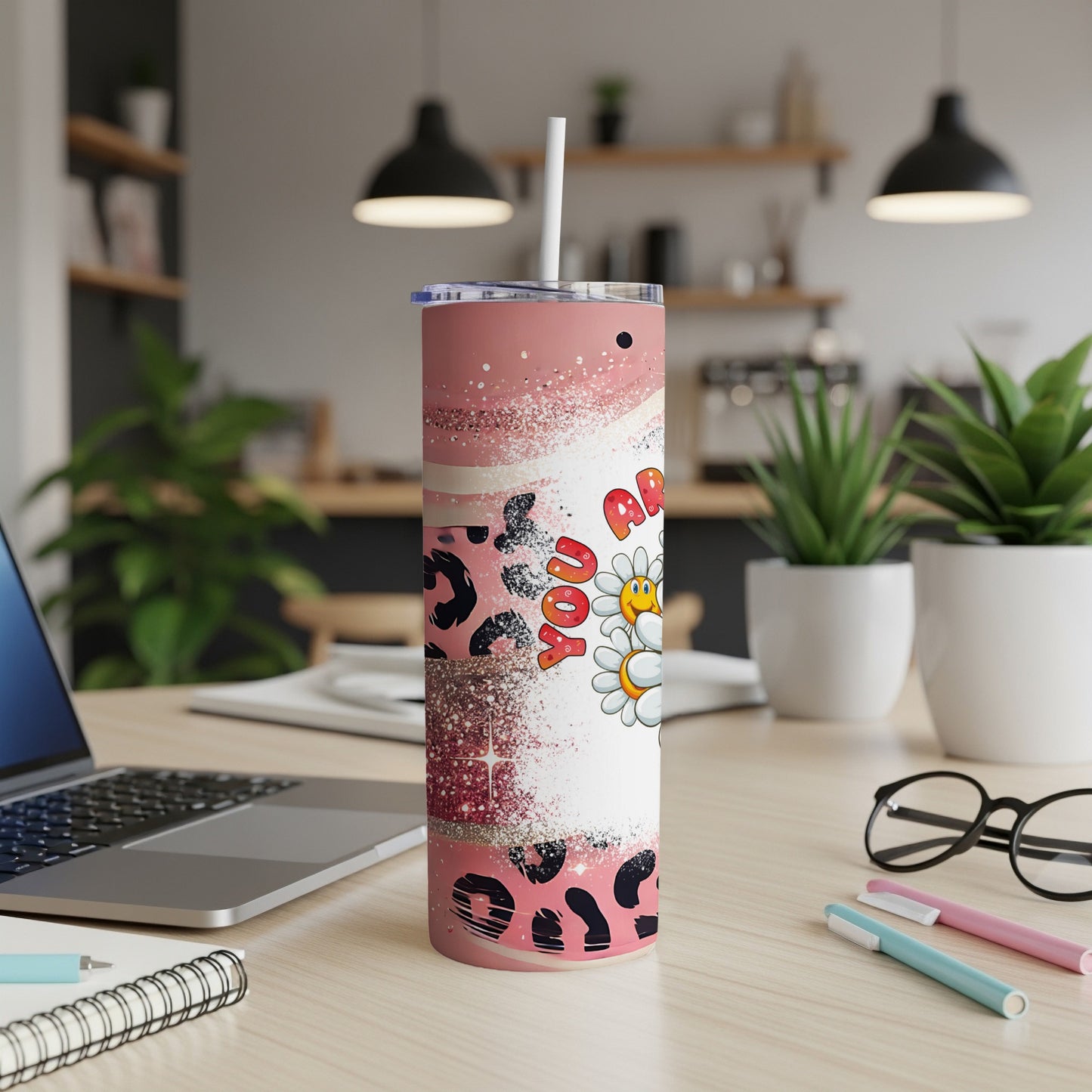 Pink leopard print tumbler with a smiling daisy and "Appreciate You" text.