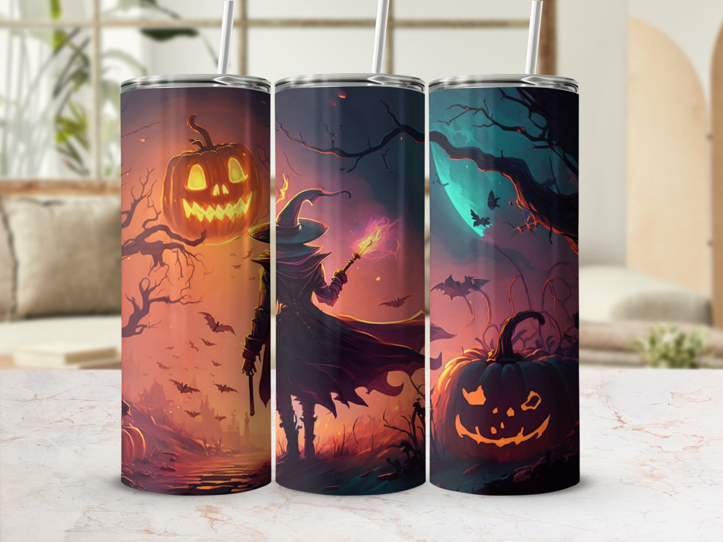 Three tumblers with Halloween-themed artwork featuring witches, bats, and jack-o'-lanterns.