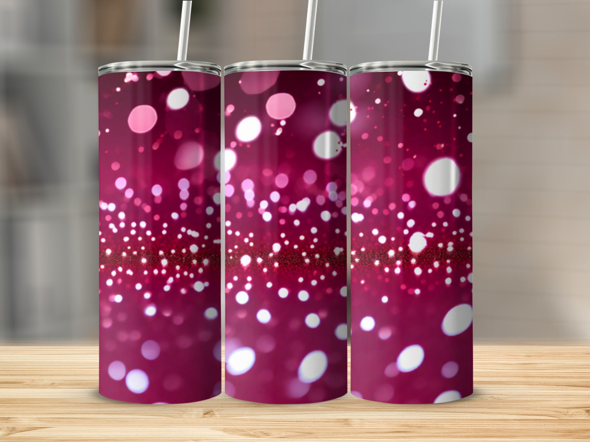 Three tumblers with a sparkly pink bokeh background and straw.