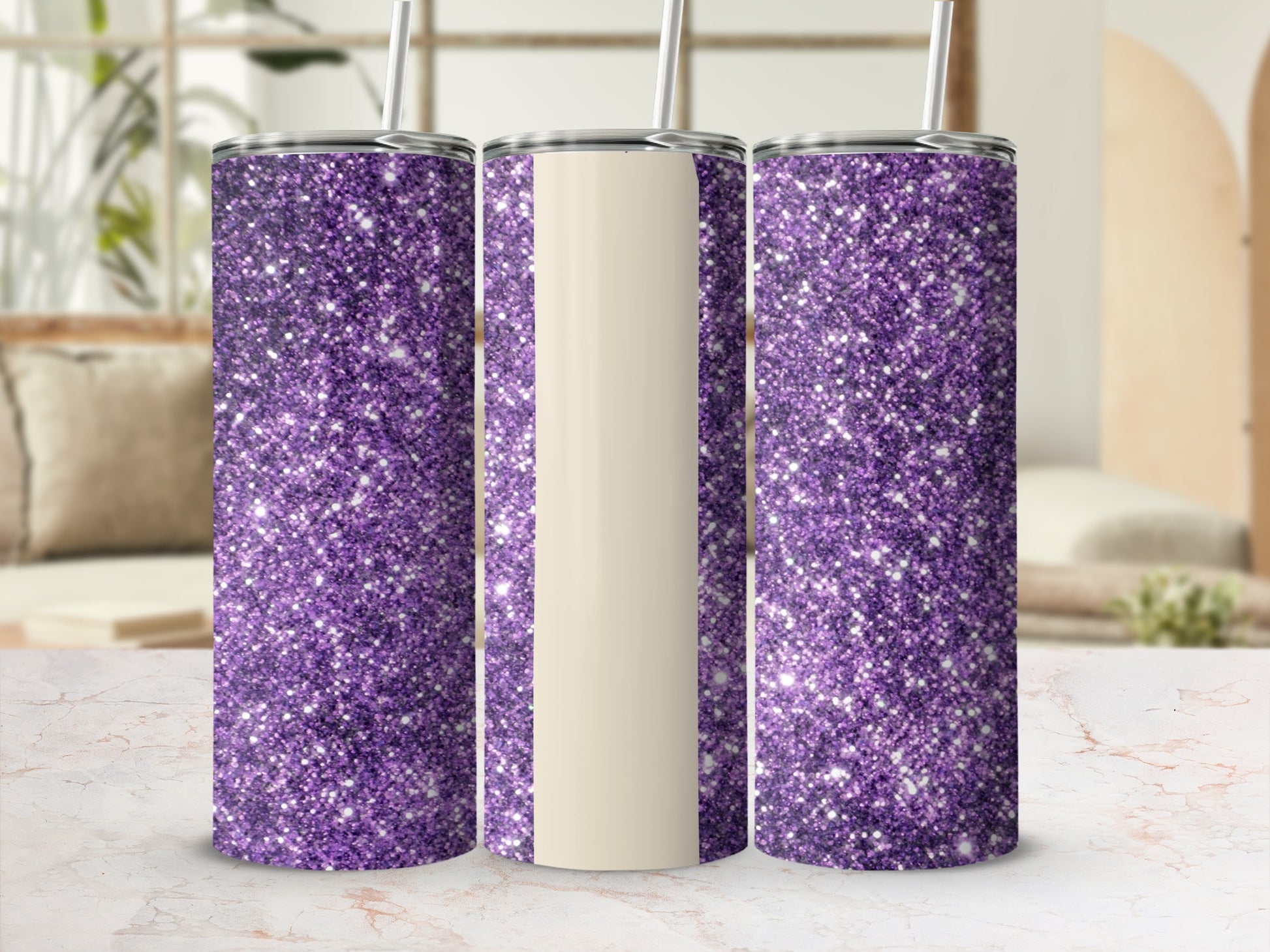 Three purple glitter tumblers with cream-colored sections, arranged on a marble surface.