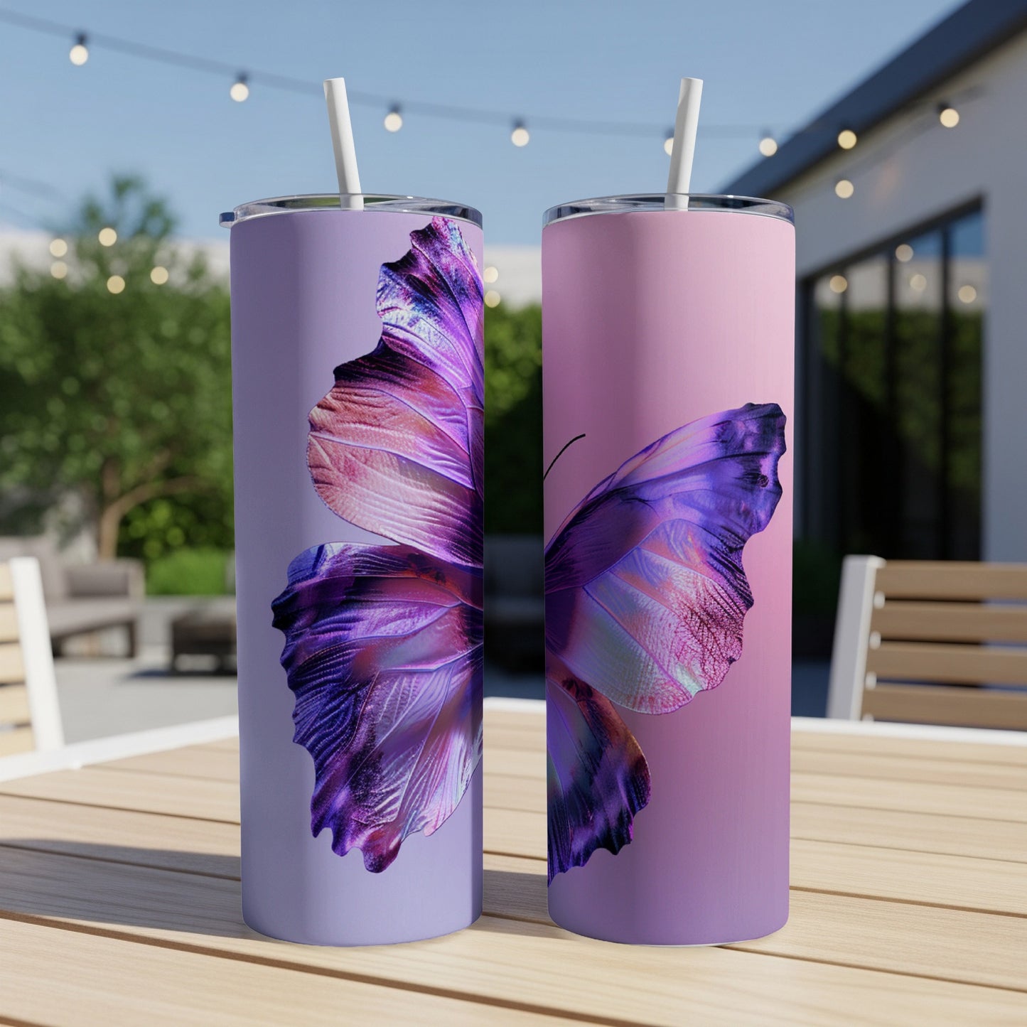 Two tall tumblers with iridescent butterfly wings design.