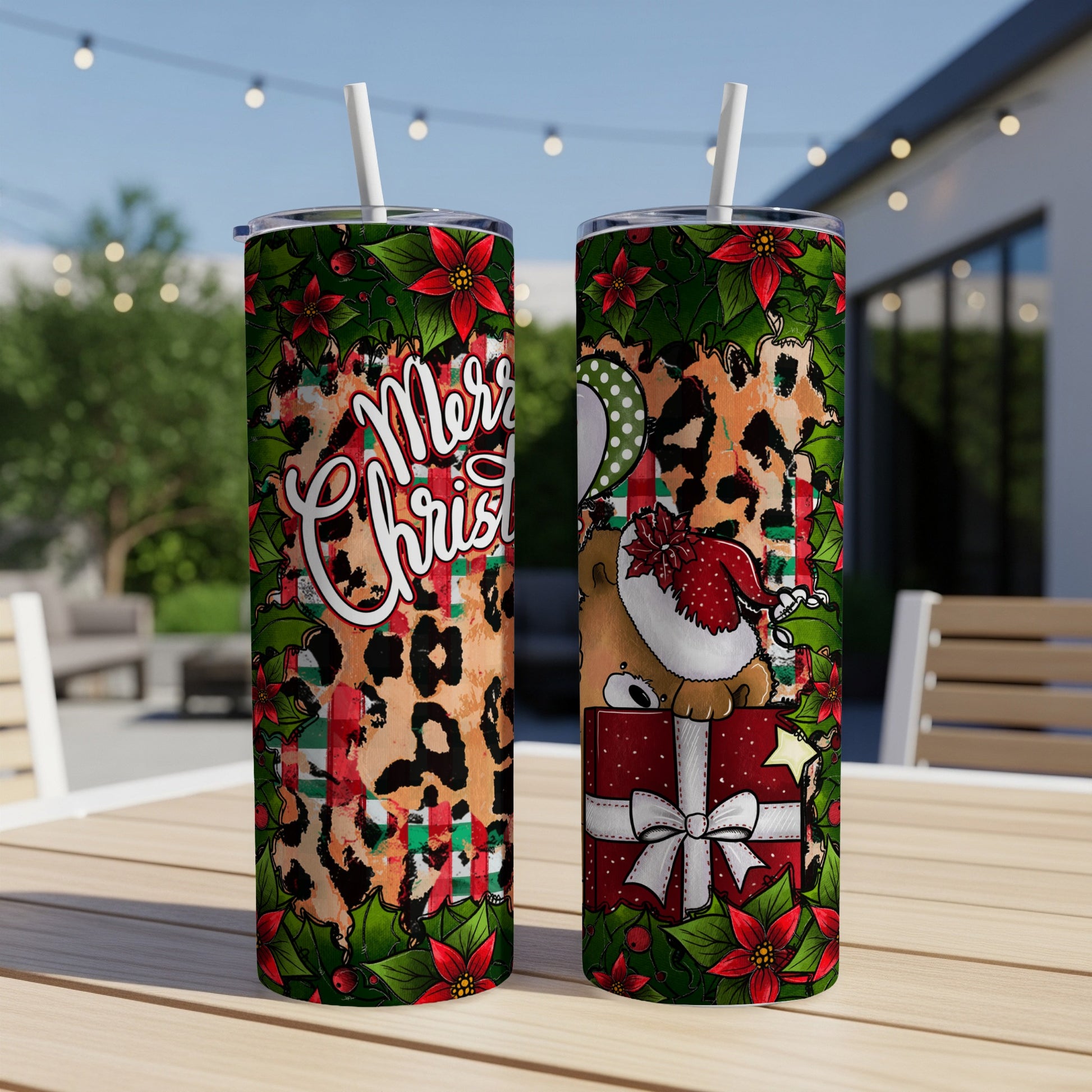 Two Christmas-themed tumblers with a bear, gift, balloons, and leopard print.
