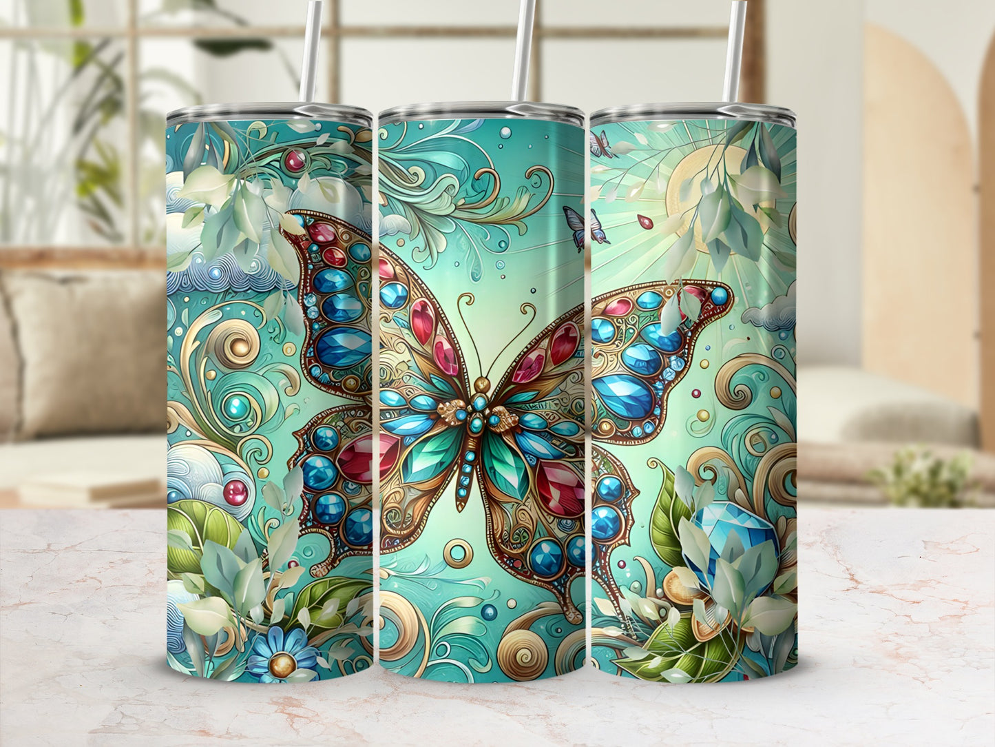 Teal tumbler with iridescent butterfly and jeweled accents, on marble surface.