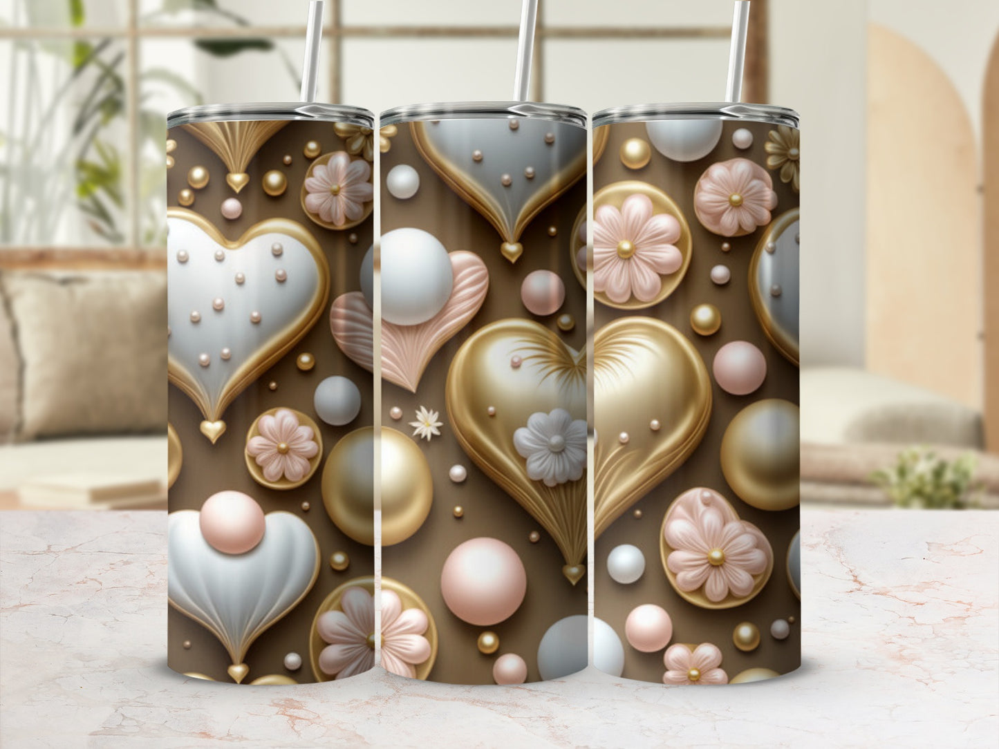 Three heart-themed tumblers with floral and pearl embellishments.