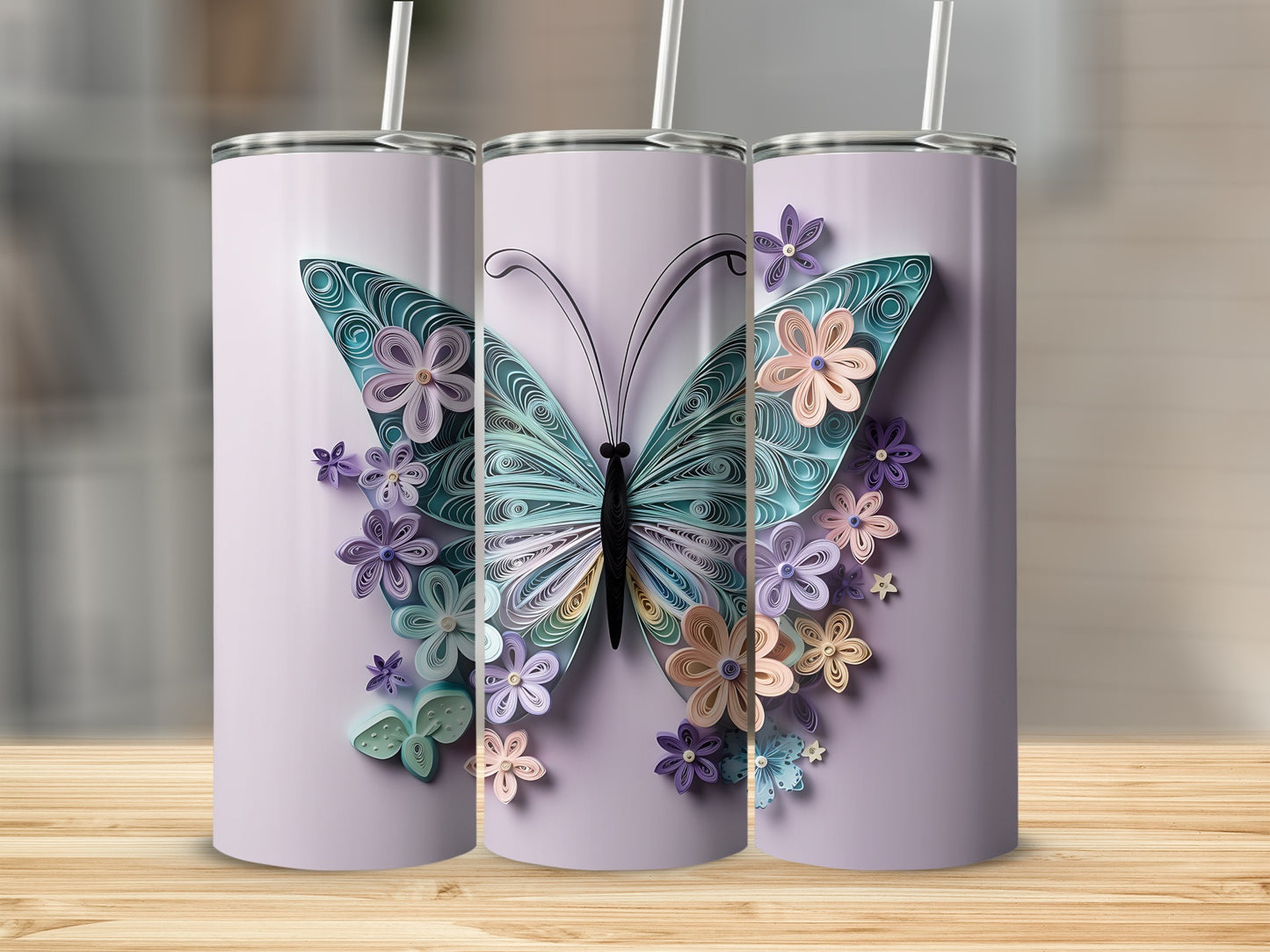 Purple tumblers with a quilled butterfly and floral design.