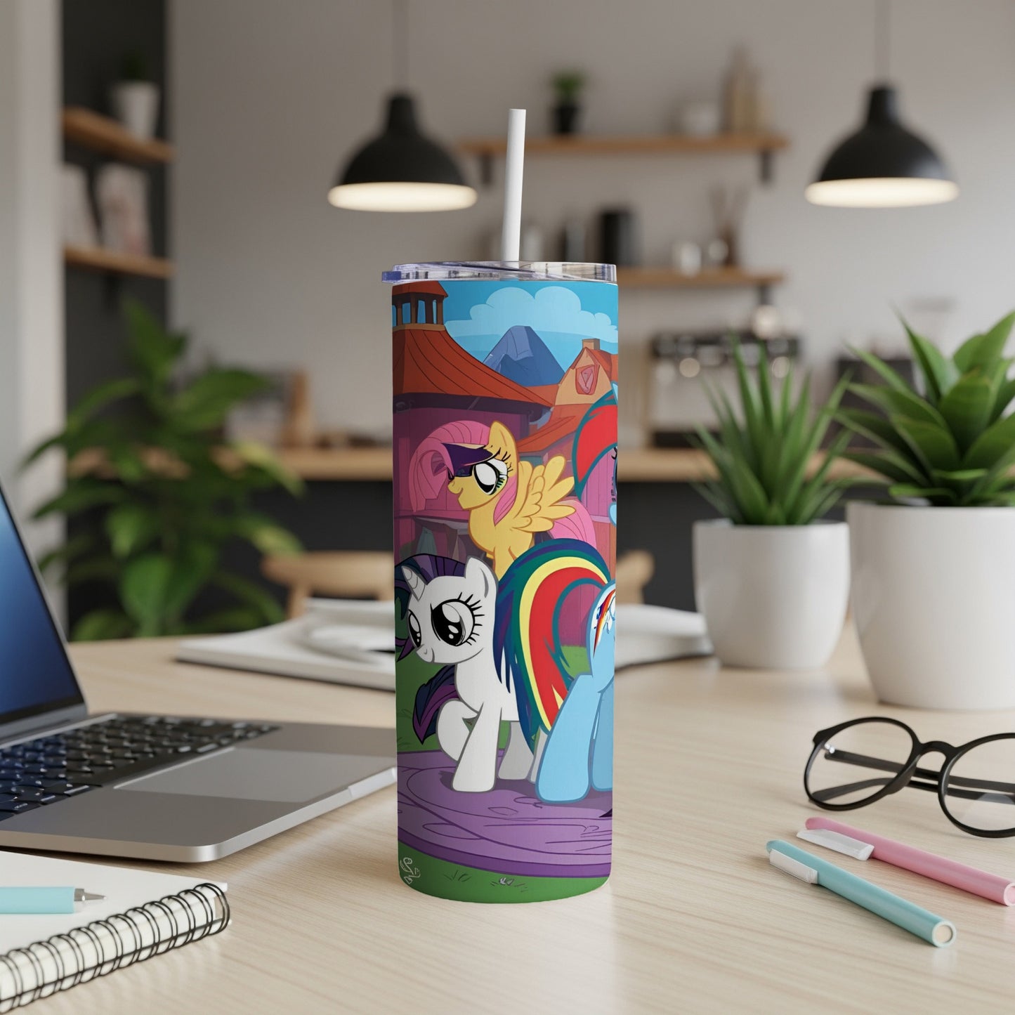 My Little Pony characters on a colorful tumbler with straw.