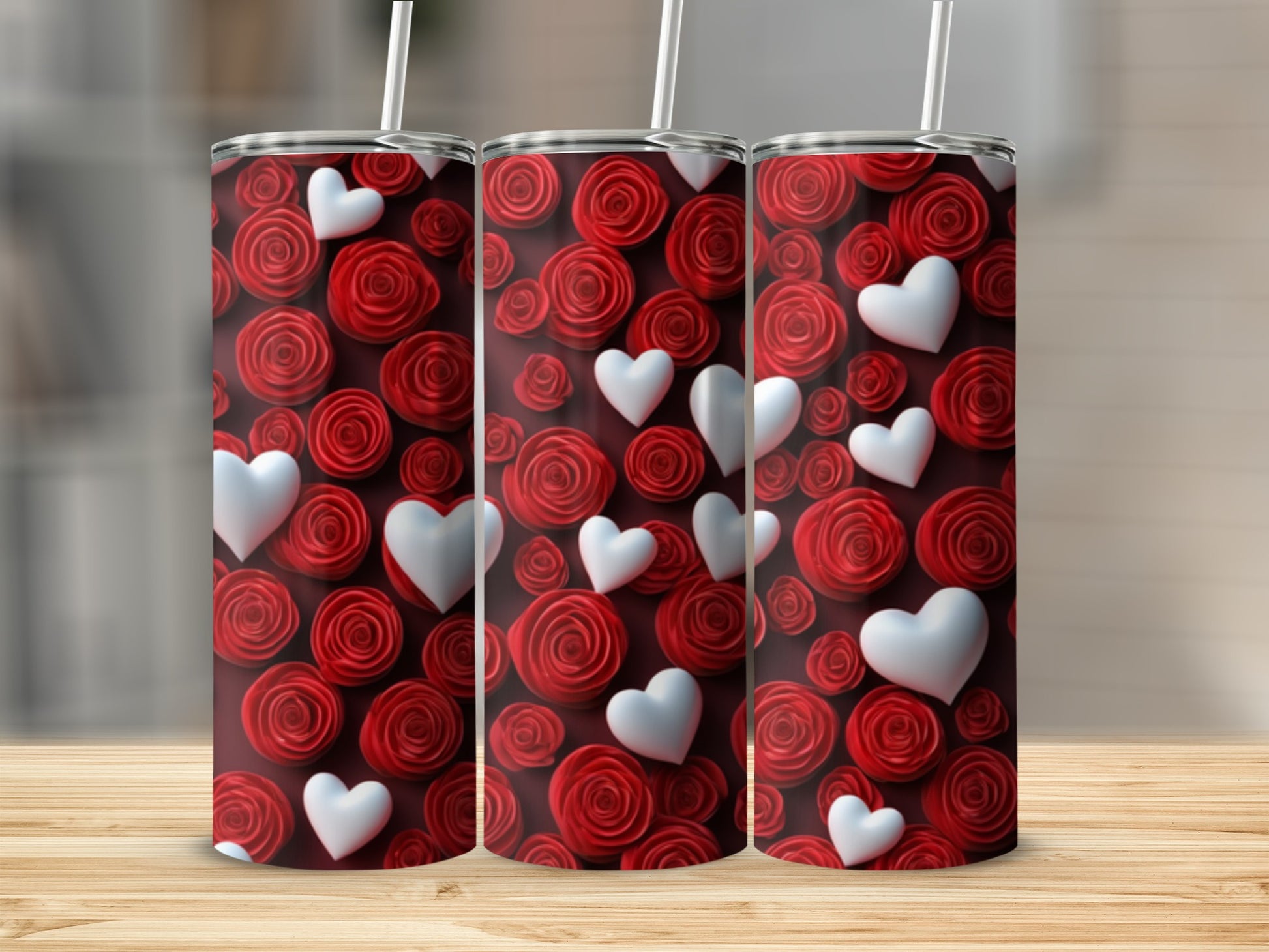 Three tumblers with a pattern of red roses and white hearts.